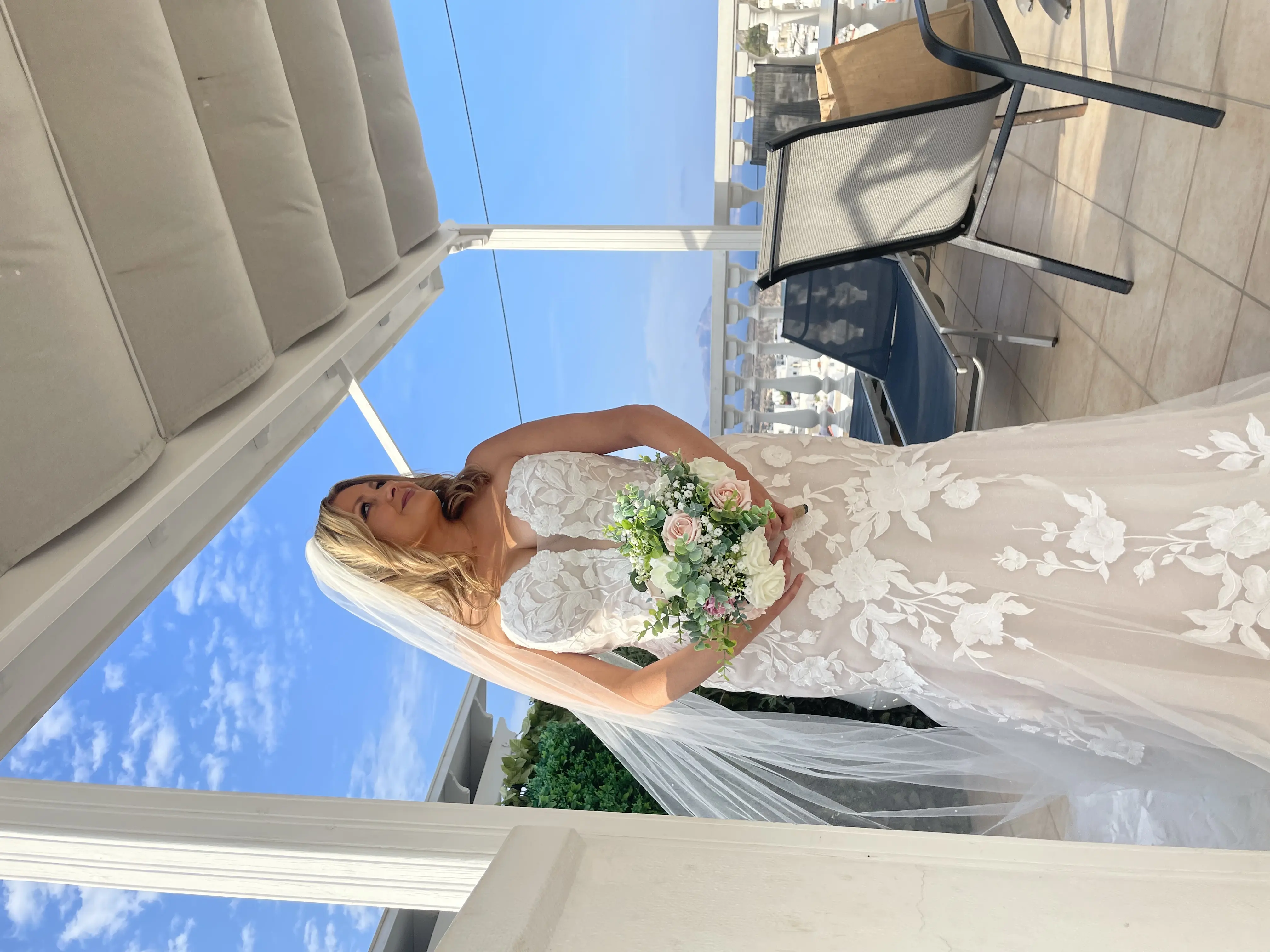 Bride wearing Hattie wedding dress by Rebecca Ingram