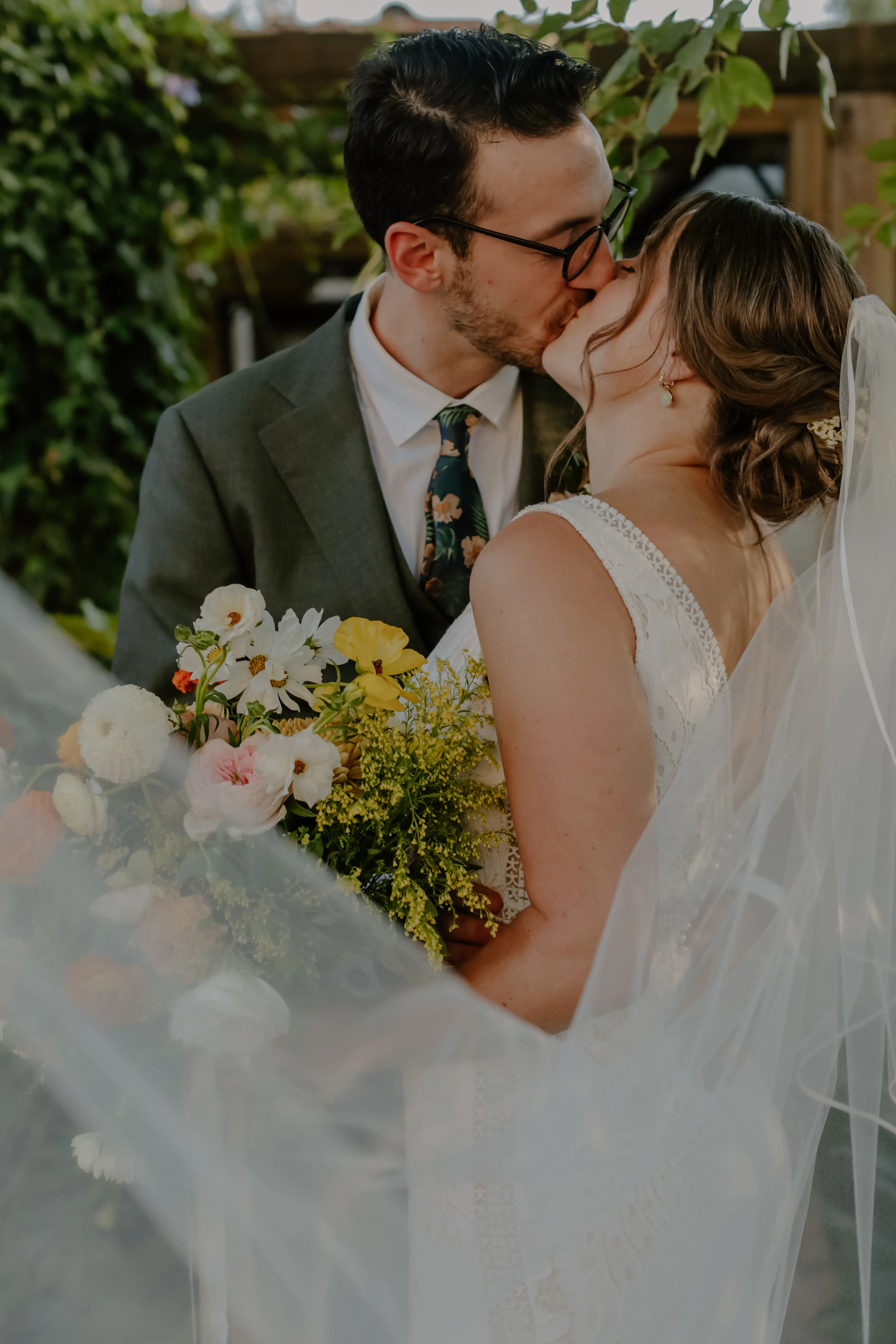 Bride wearing sexy boho lace wedding dress.