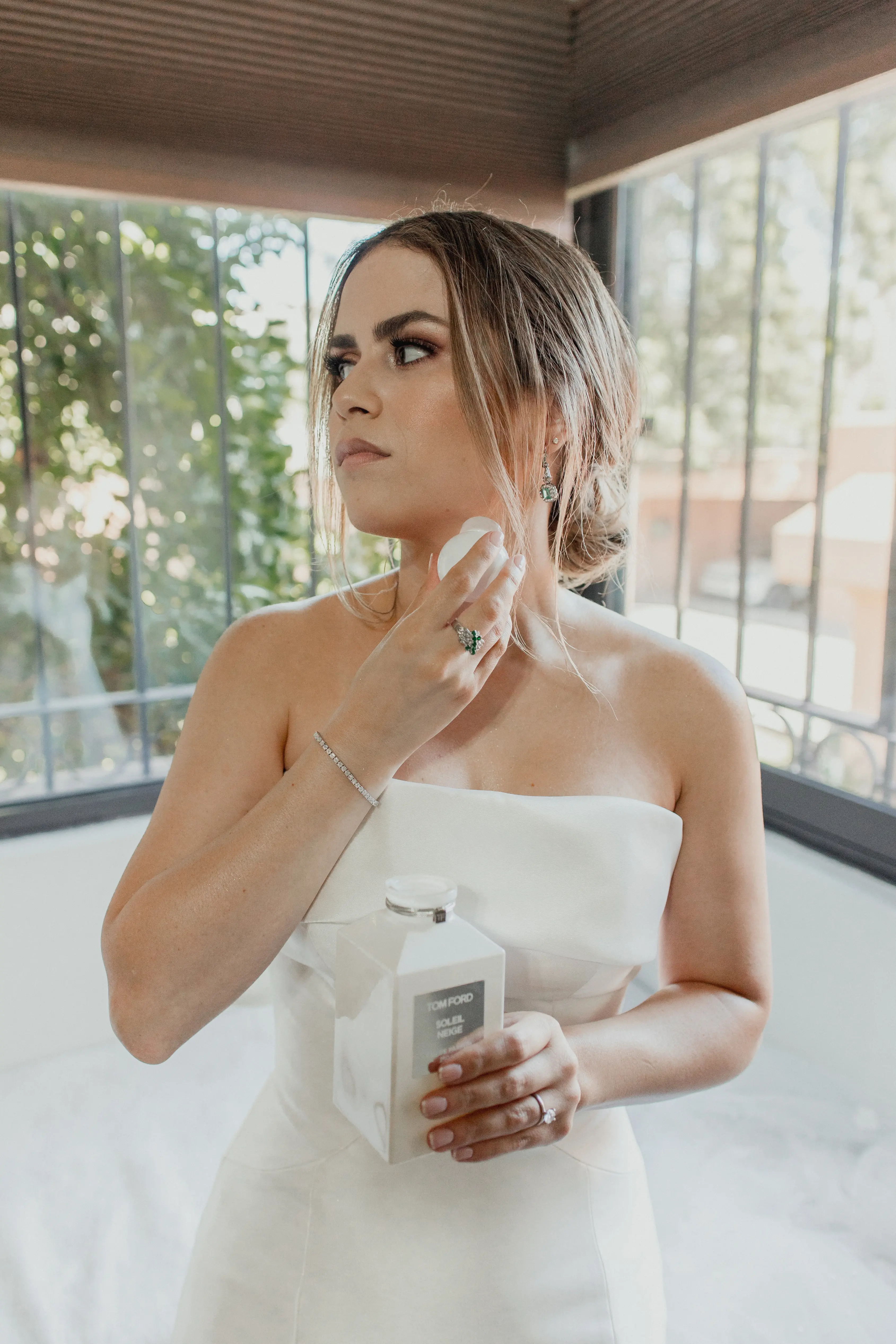 Bride In Modern Strapless Wedding Dress Called Mitchell By Maggie Sottero