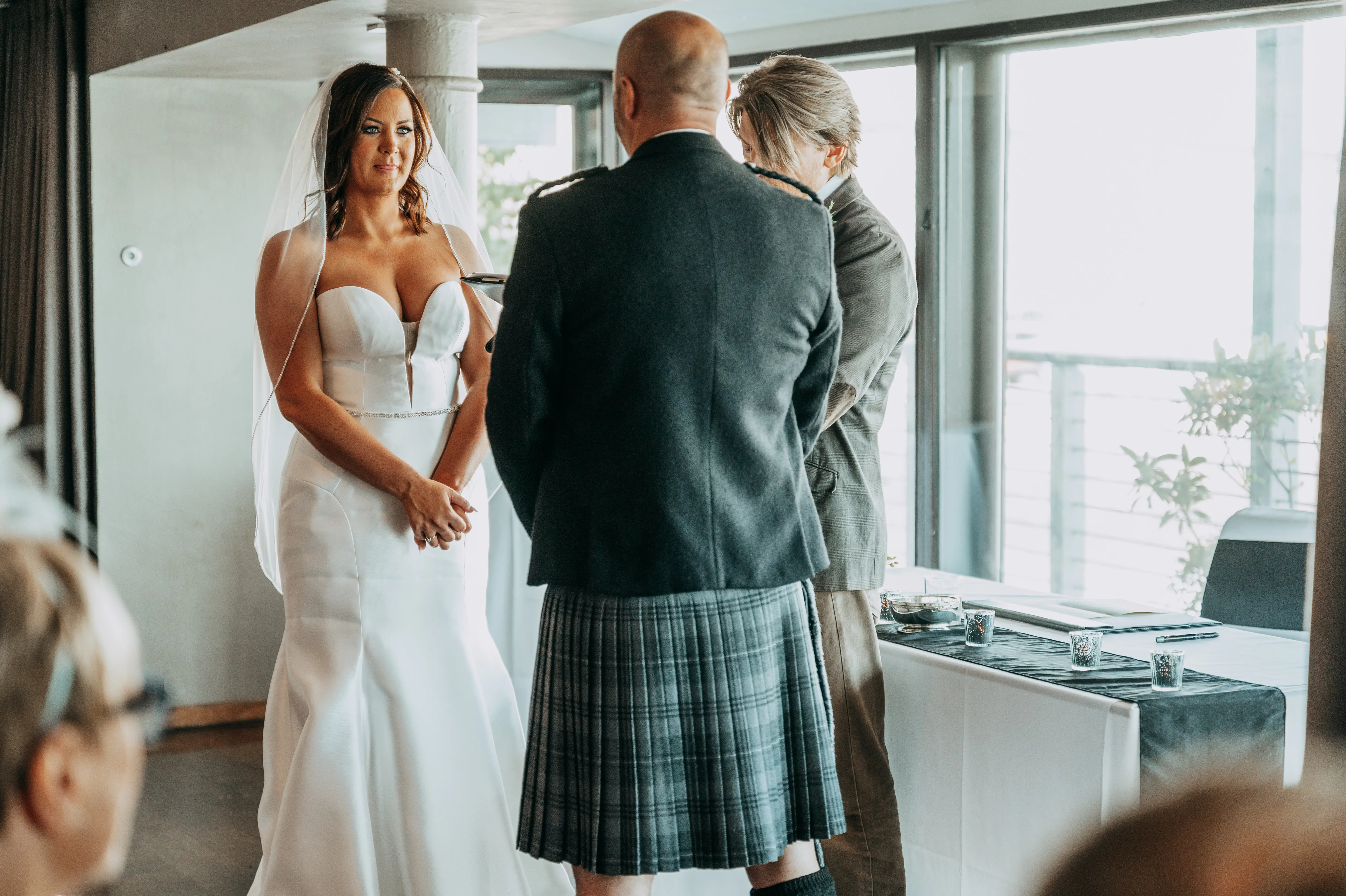 Bride Wearing Simple Sexy Wedding Dress Called Pippa By Rebecca Ingram With Groom At The Ceremony