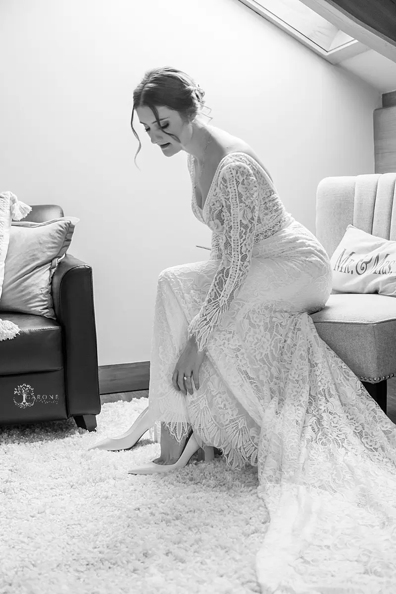 Bride Wearing Boho Sleeved Wedding Dress Called Drita By Maggie Sottero Getting Ready