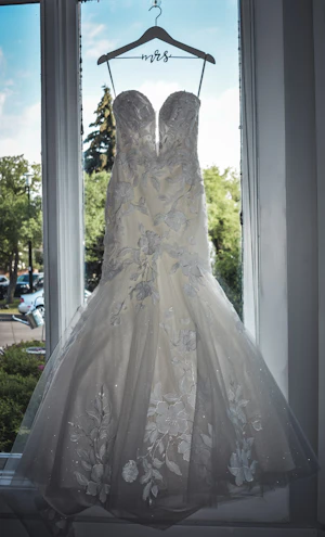 Lace Mermaid Wedding Dress Called Hattie By Rebecca Ingram Hanging From The Wedding