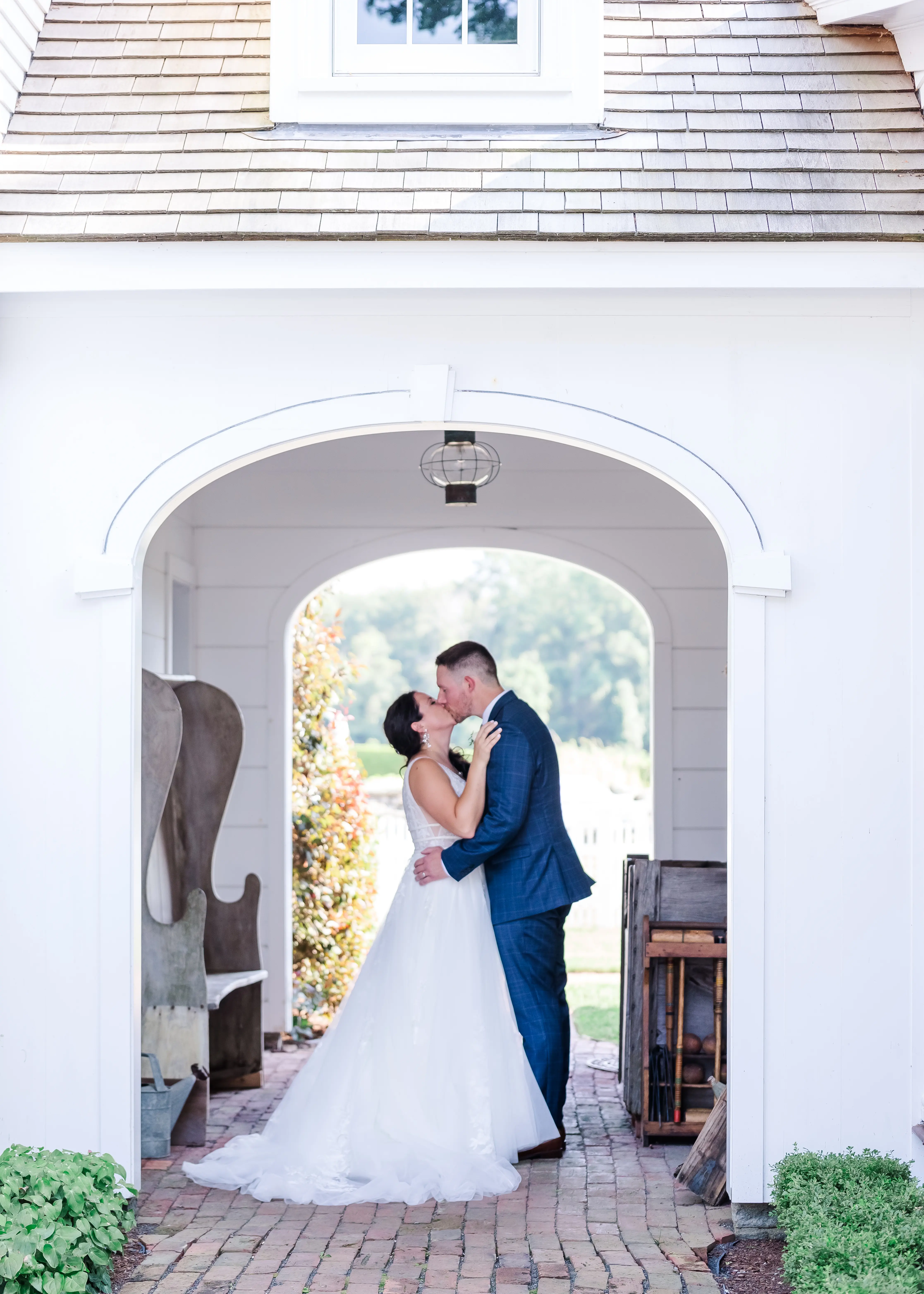 Groom With Bride Wearing Lace A-Line Wedding Dress Raelynn By Rebecca Ingram