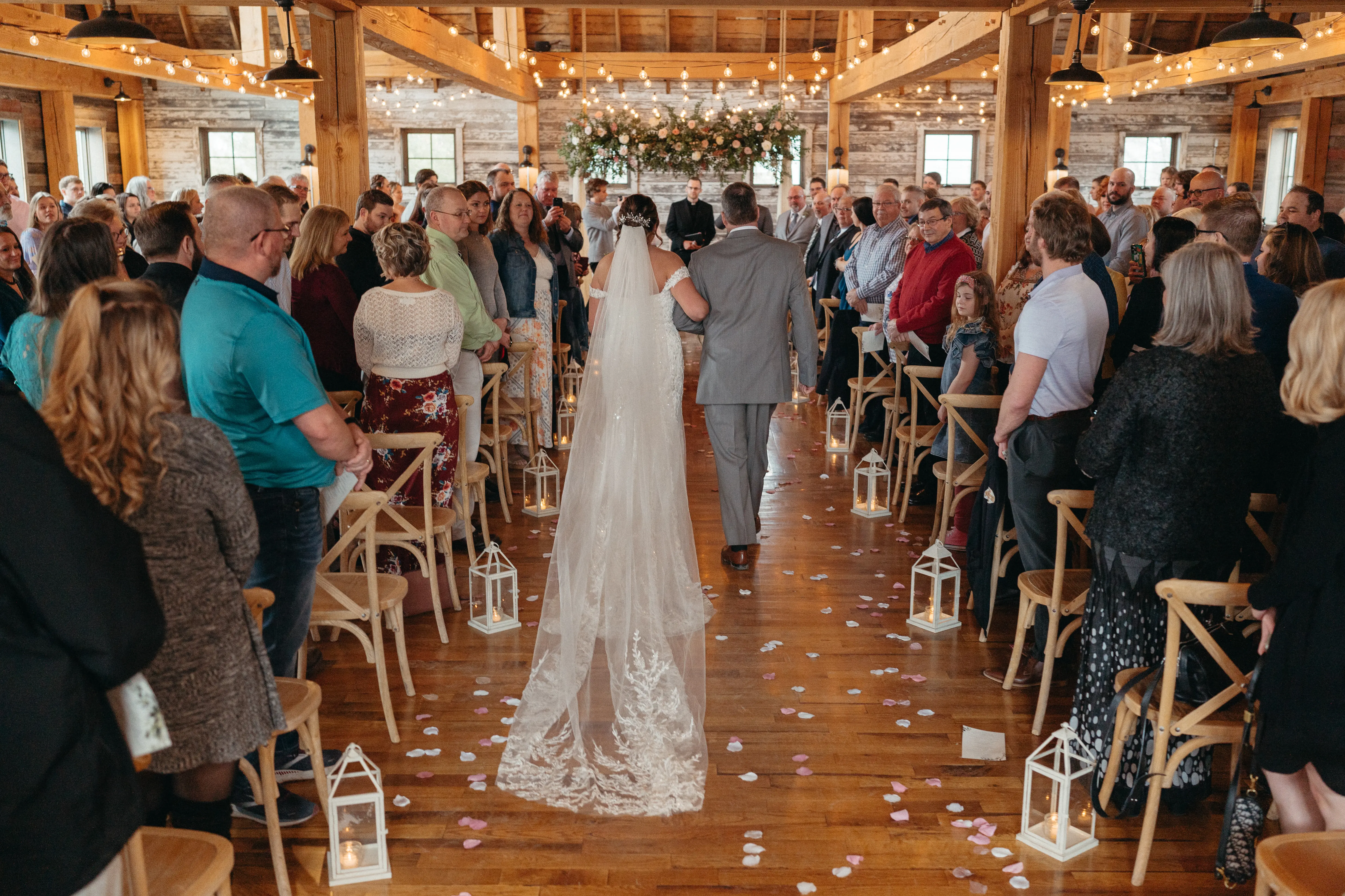 Bride Wearing Lace Beaded Wedding Dress Called Charmaine By Maggie Sottero Walking Down The Aisle