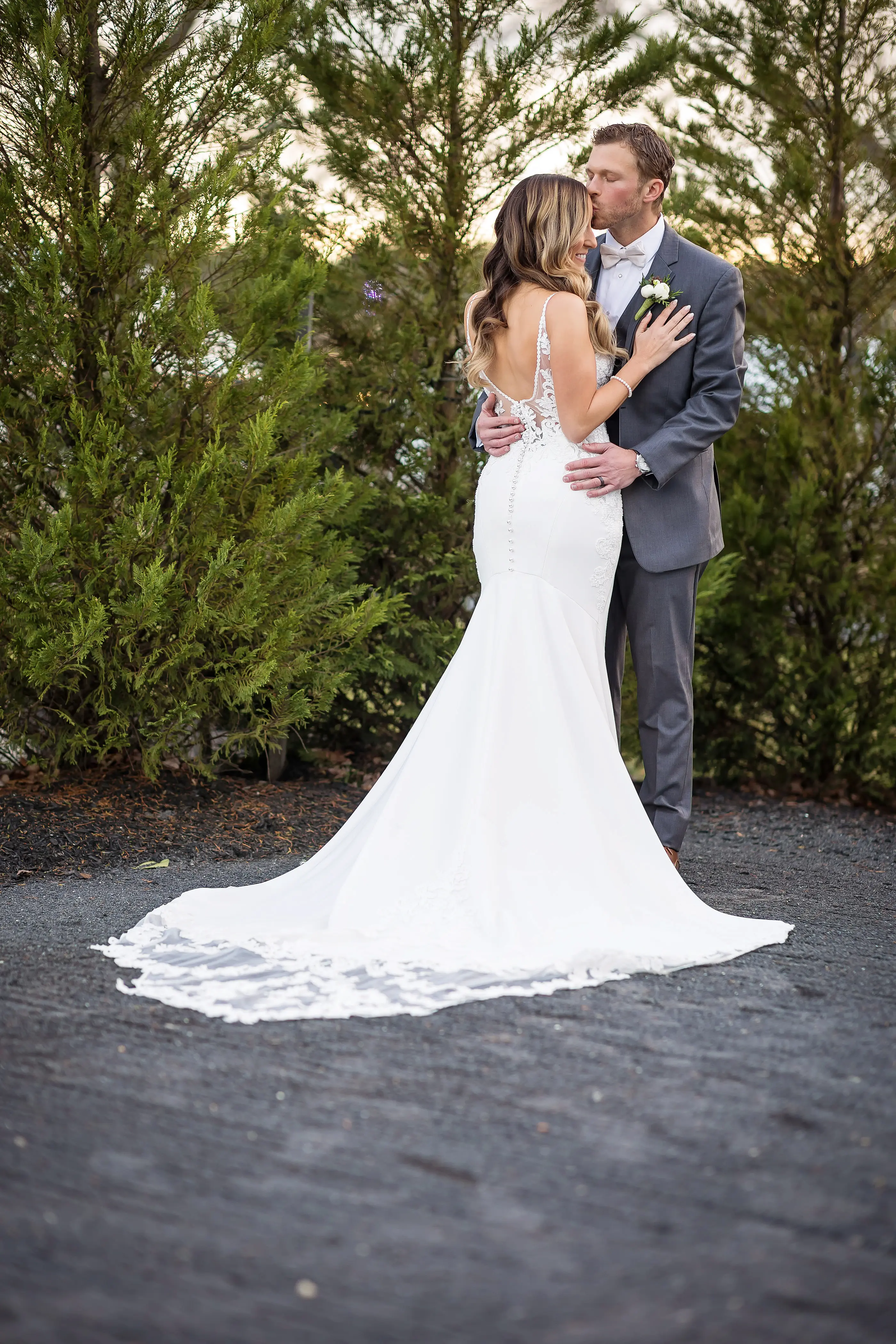 Bride Wearing Lace Mermaid Wedding Gown Called Nikki By Maggie Sottero With Groom