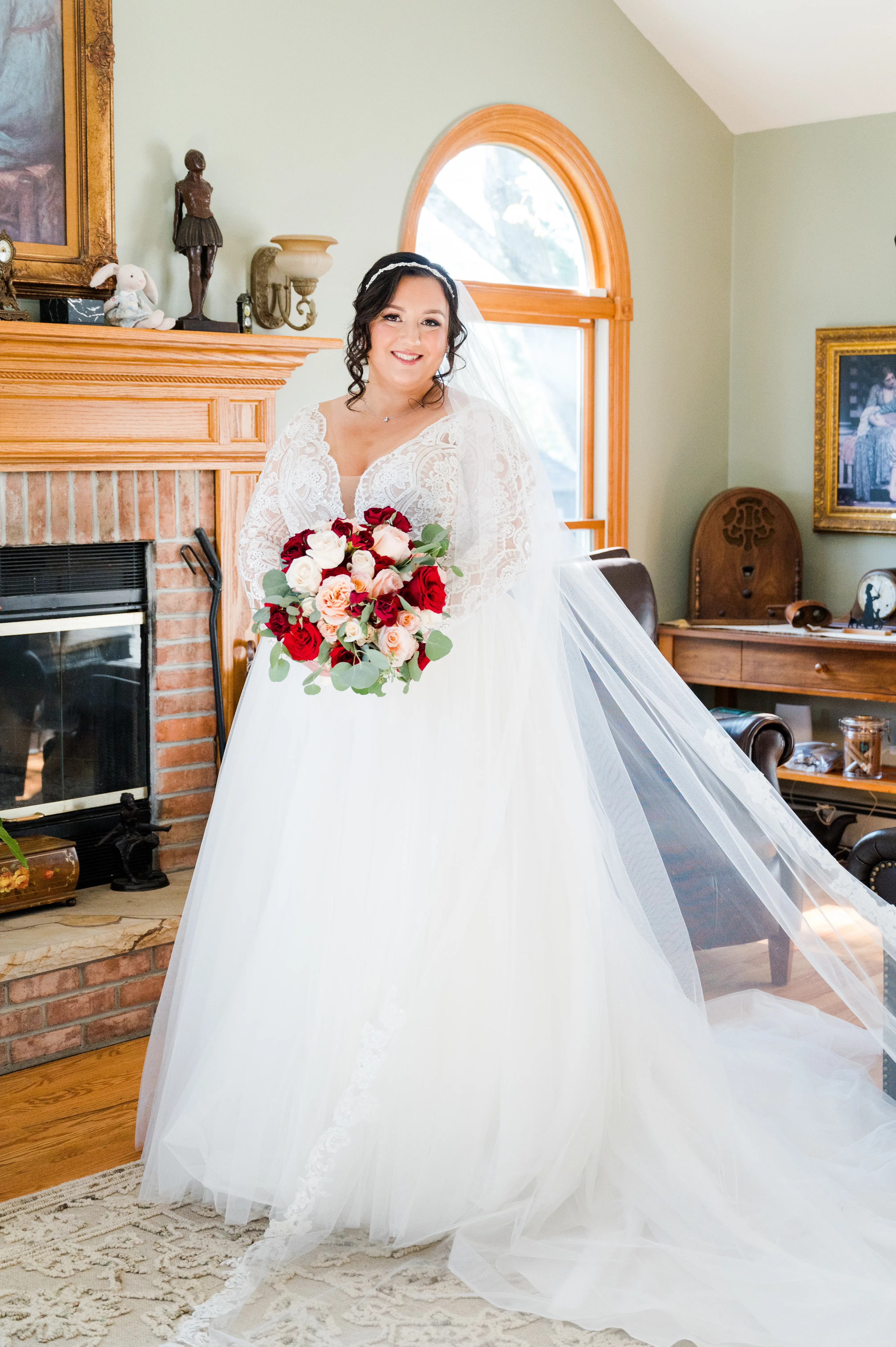 Bride Wearing Long Sleeve Lace Ball Gown With Tulle Skirt Called Mallory Dawn By Maggie Sottero