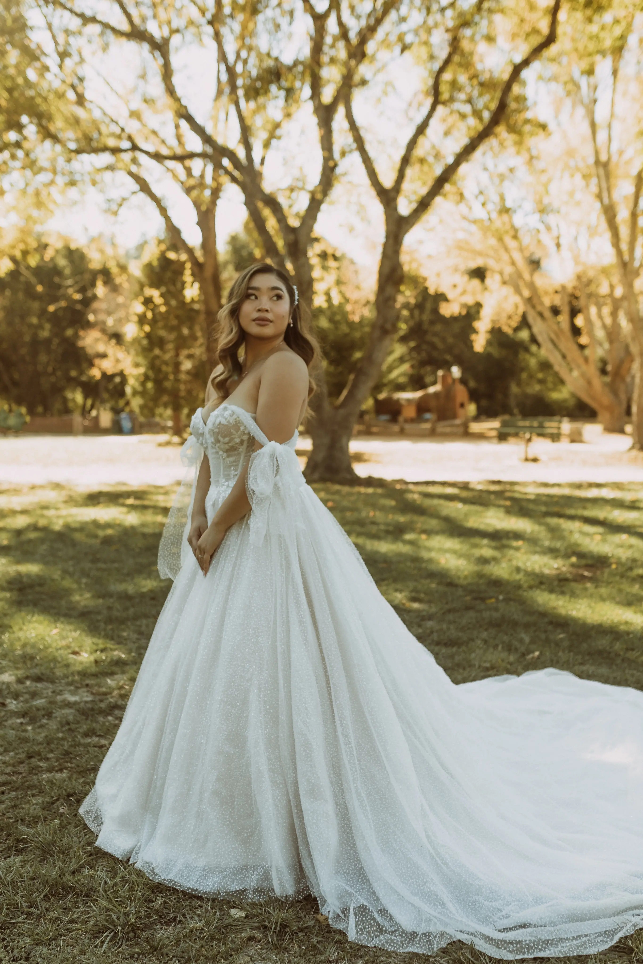 Bride In Sparkly Off-The-Shoulder Wedding Dress Called Shasta By Sottero And Midgley