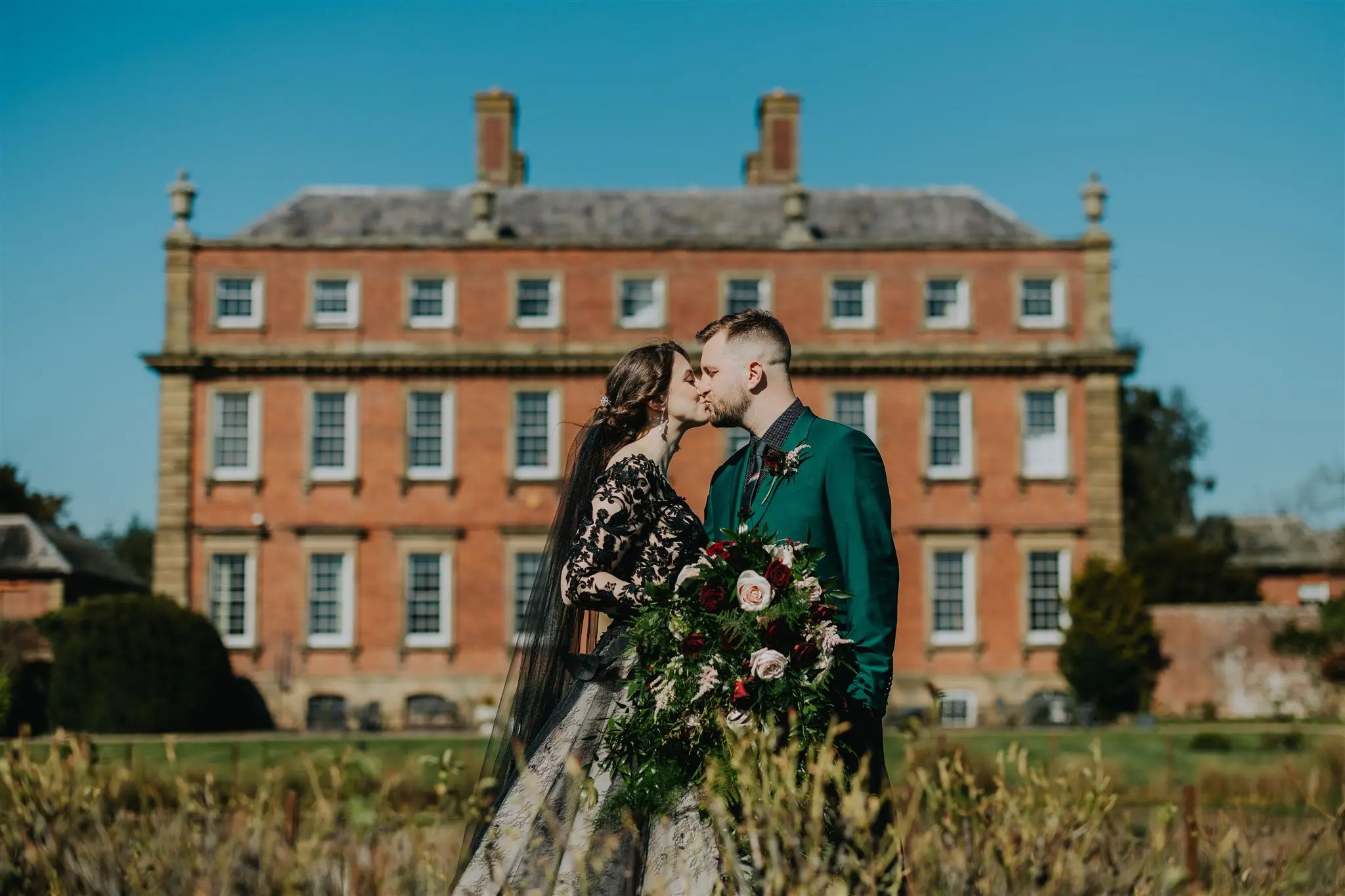 Real Bride in Chic Black Ball Gown Wedding Dress with Contrasting Layers of Tulle and Lace Called Zander by Sottero & Midgley