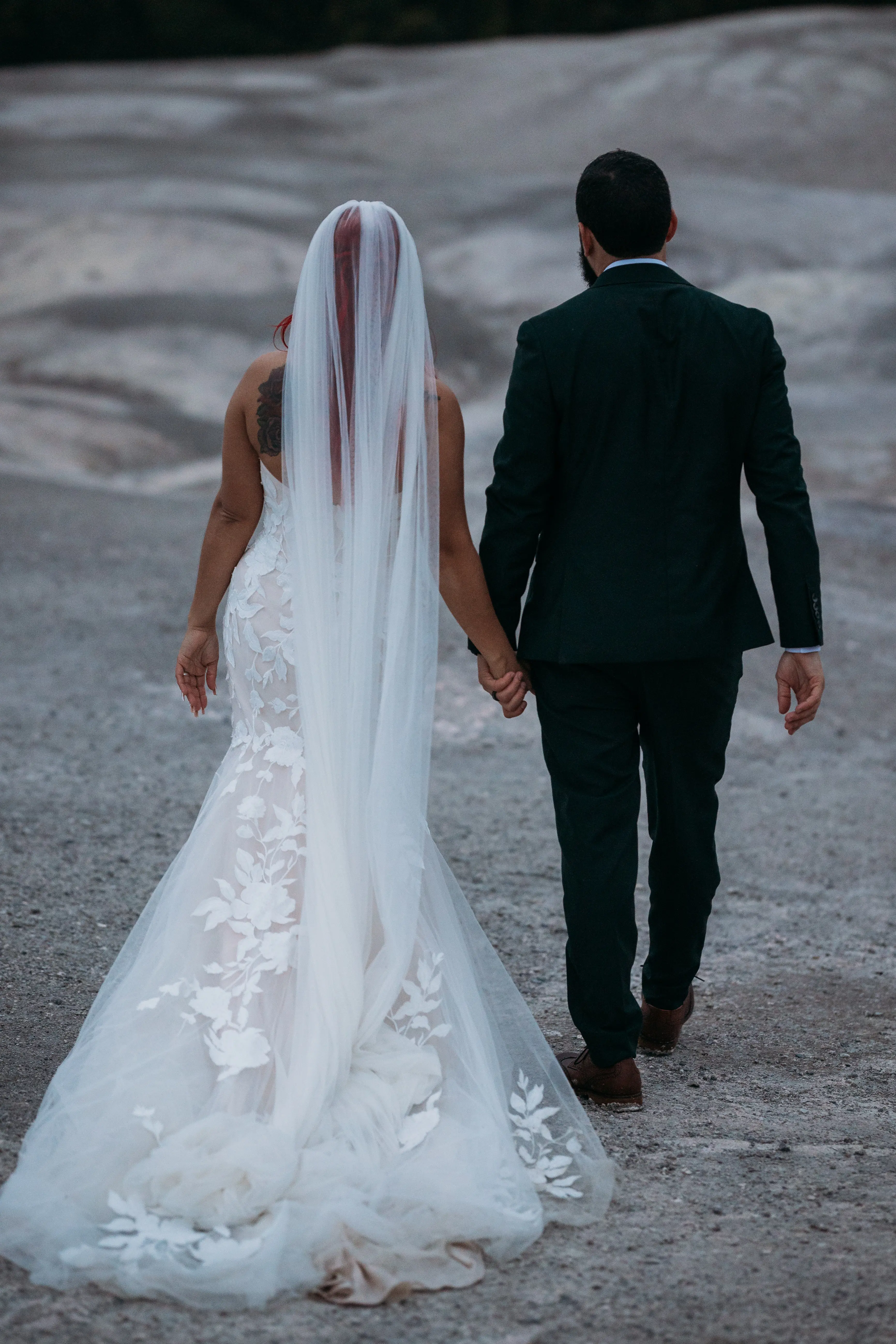 Groom On The Beach With Bride In White Dress Named Hattie By Rebecca Ingram