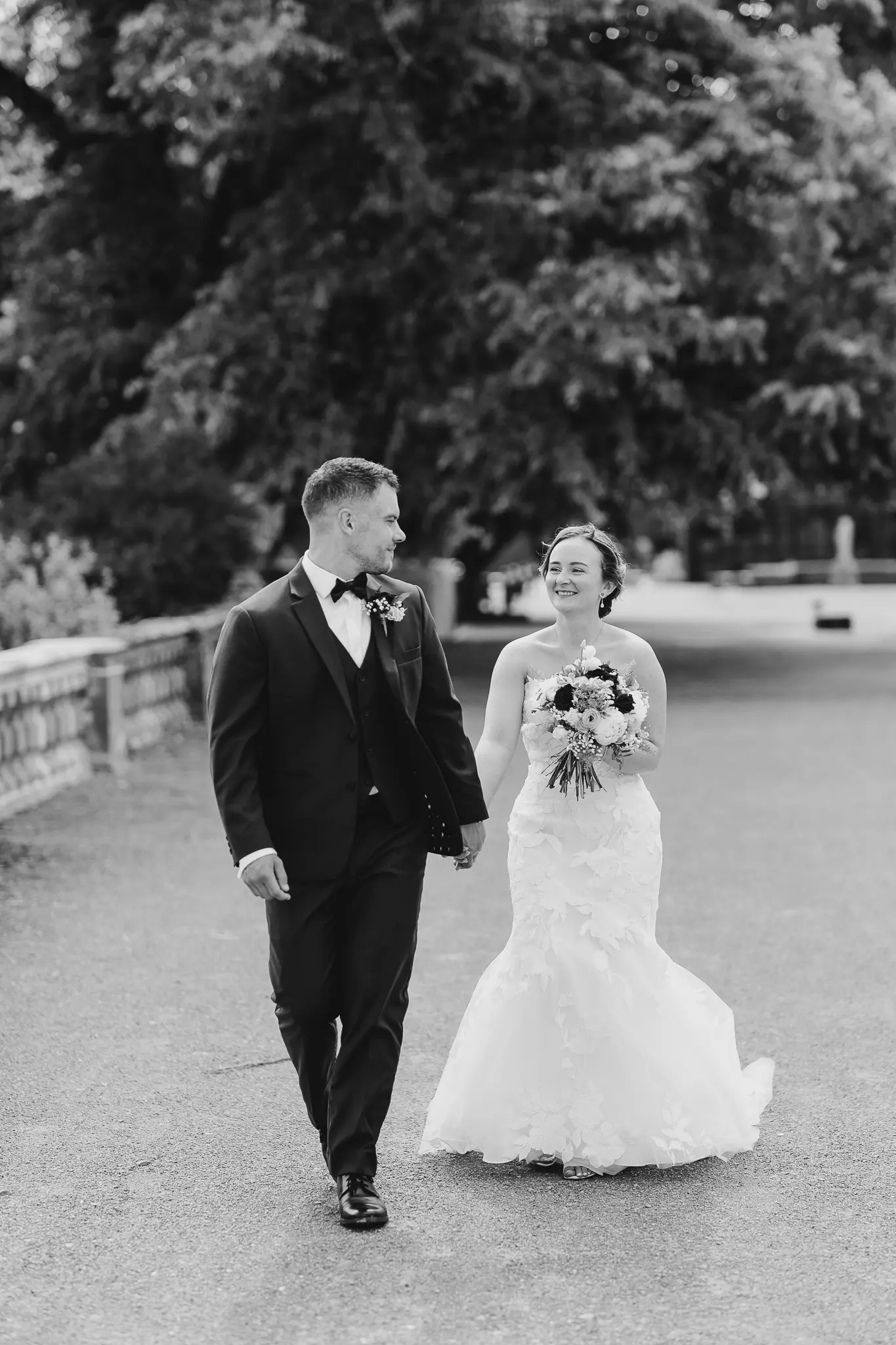 Groom With Bride Wearing Strapless Mermaid Wedding Dress With Oversized Lace Hattie By Rebecca Ingram