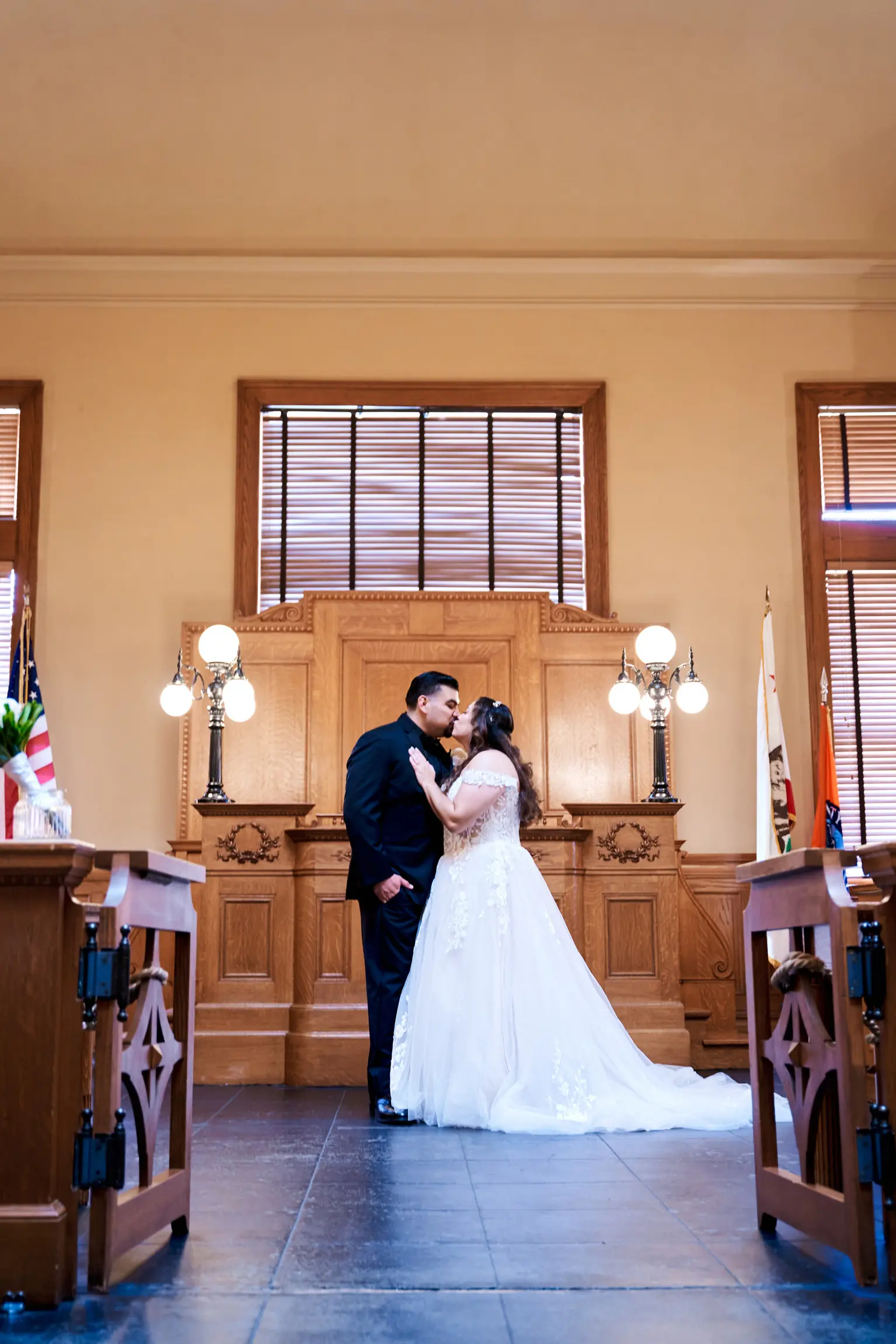 Bride Wearing Lace Ballgown Wedding Dress Called Harlem By Maggie Sottero Kissing Groom At The Courthouse
