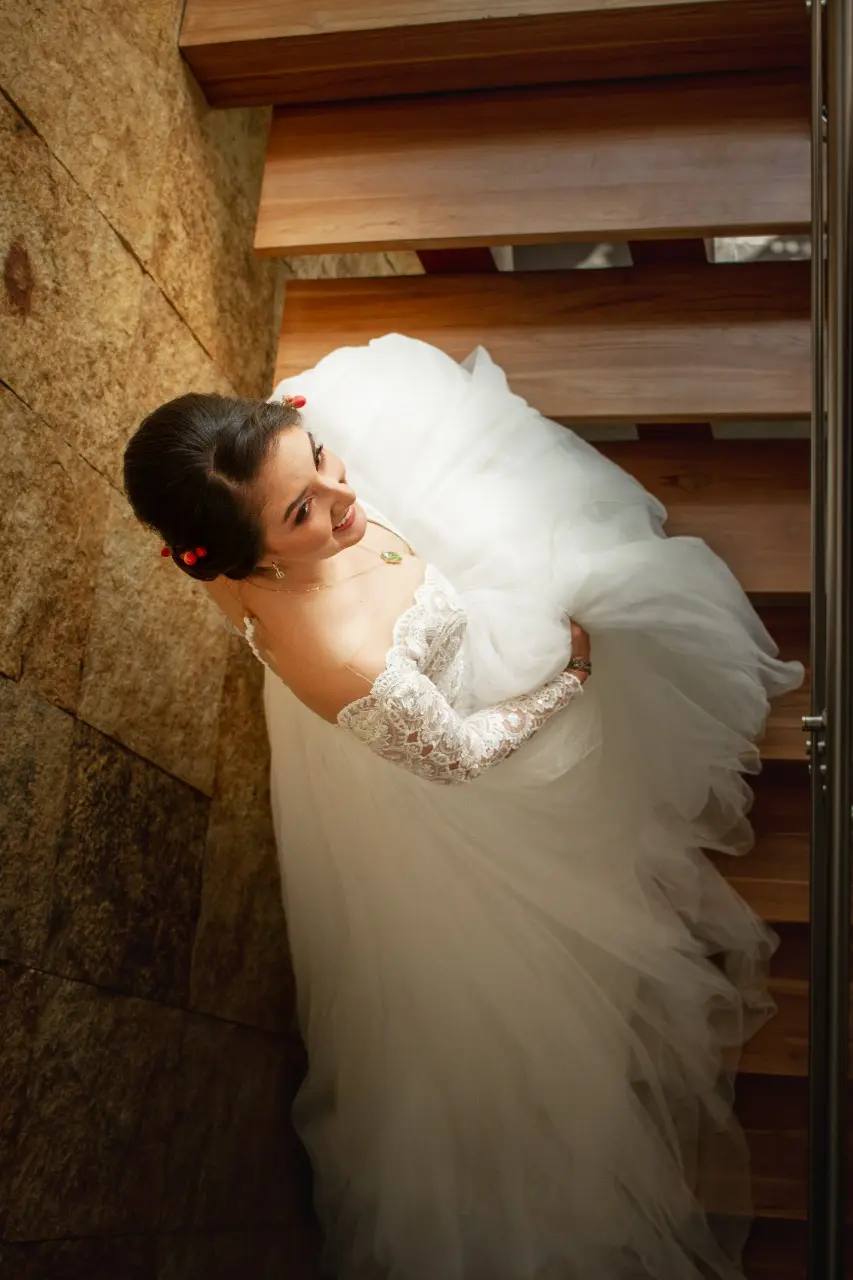 Bride in Long Sleeve Ball Gown Wedding Dress Named Mallory Dawn by Maggie Sottero
