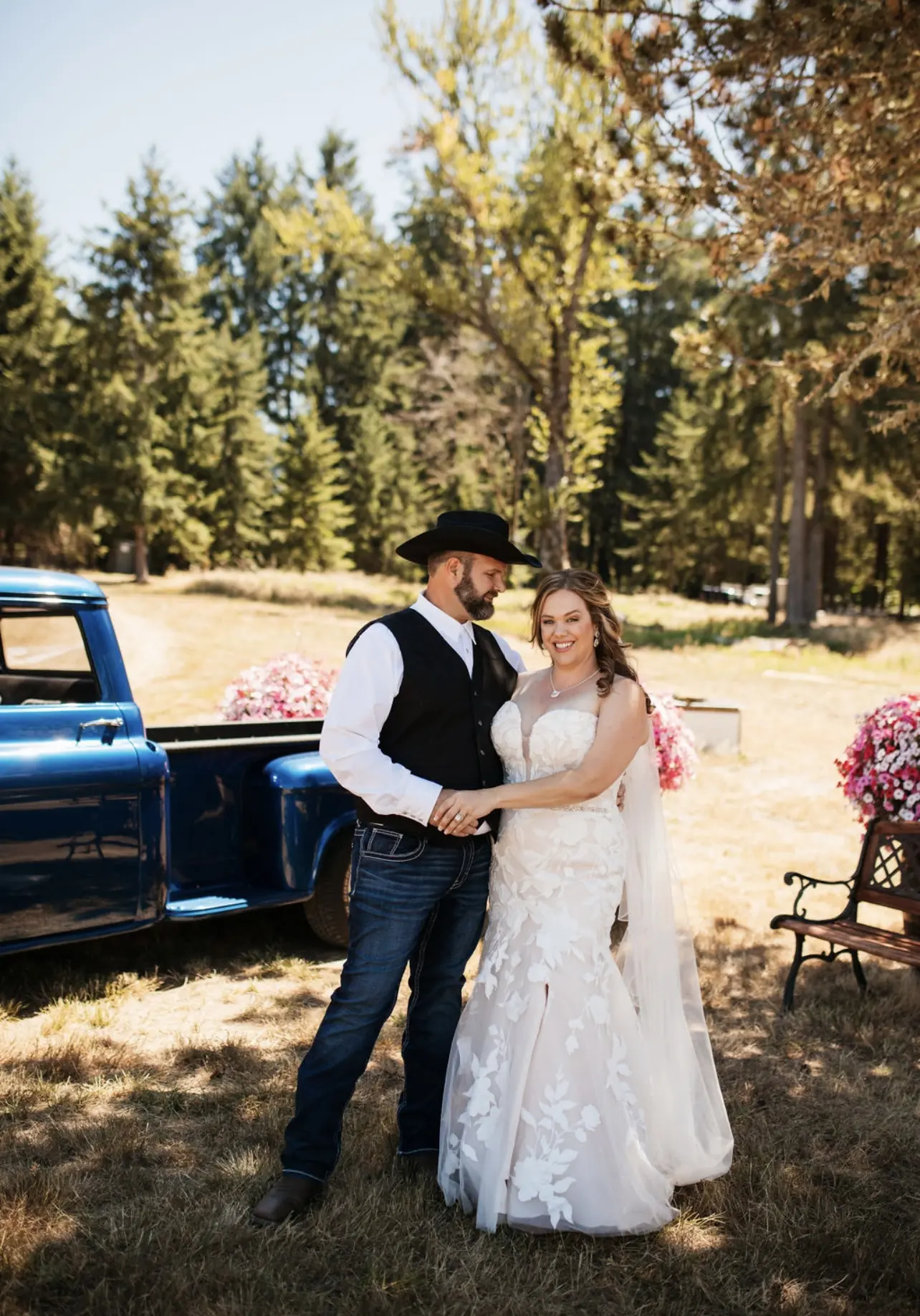 Bride wearing Hattie wedding dress by Rebecca Ingram with her husband