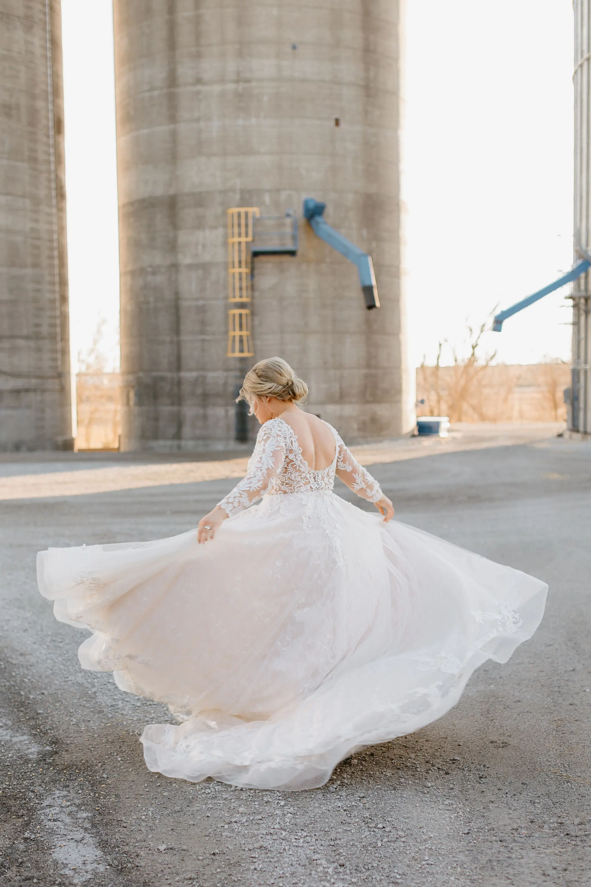 Bride Spinning In Long Sleeve Ball Gown Called Zander By Sottero And Midgley
