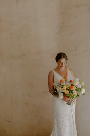 Bride wearing sexy boho lace wedding dress.