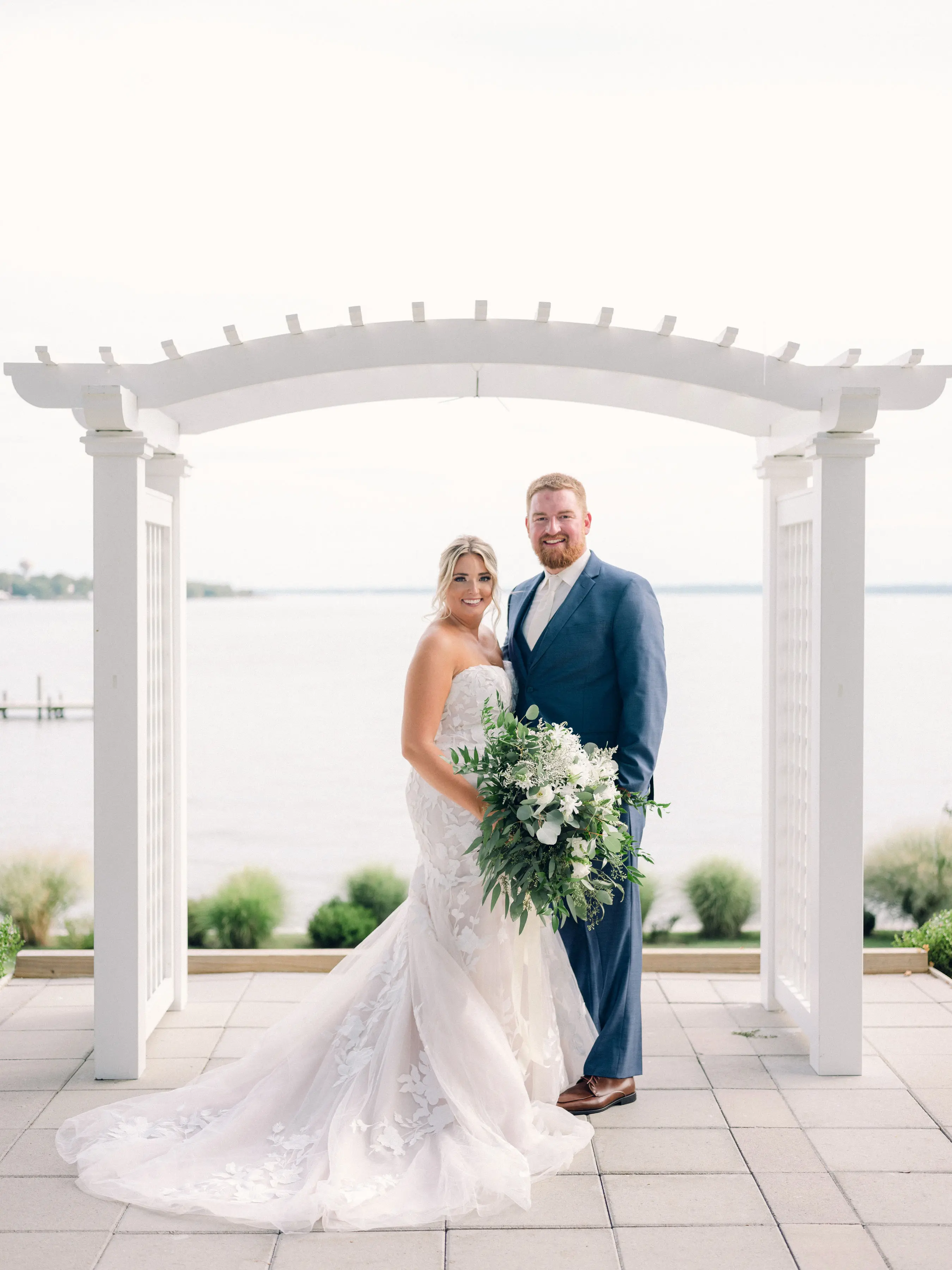 Bride Wearing Lace Mermaid Wedding Gown Called Hattie By Rebecca Ingram With Groom