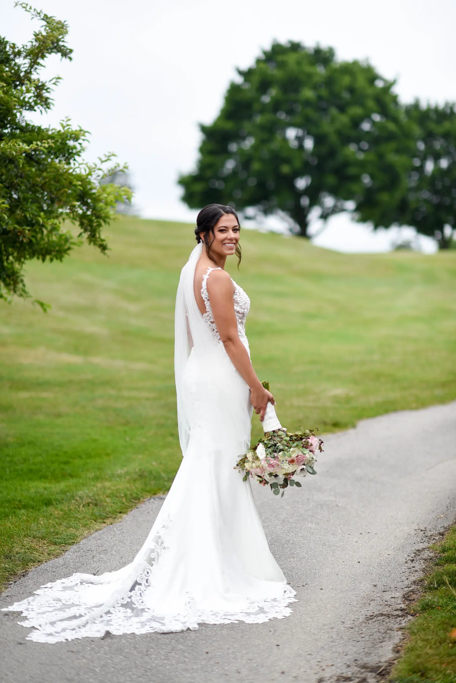 Bride wearing crepe sheath wedding dress