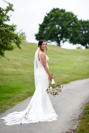Bride wearing crepe sheath wedding dress
