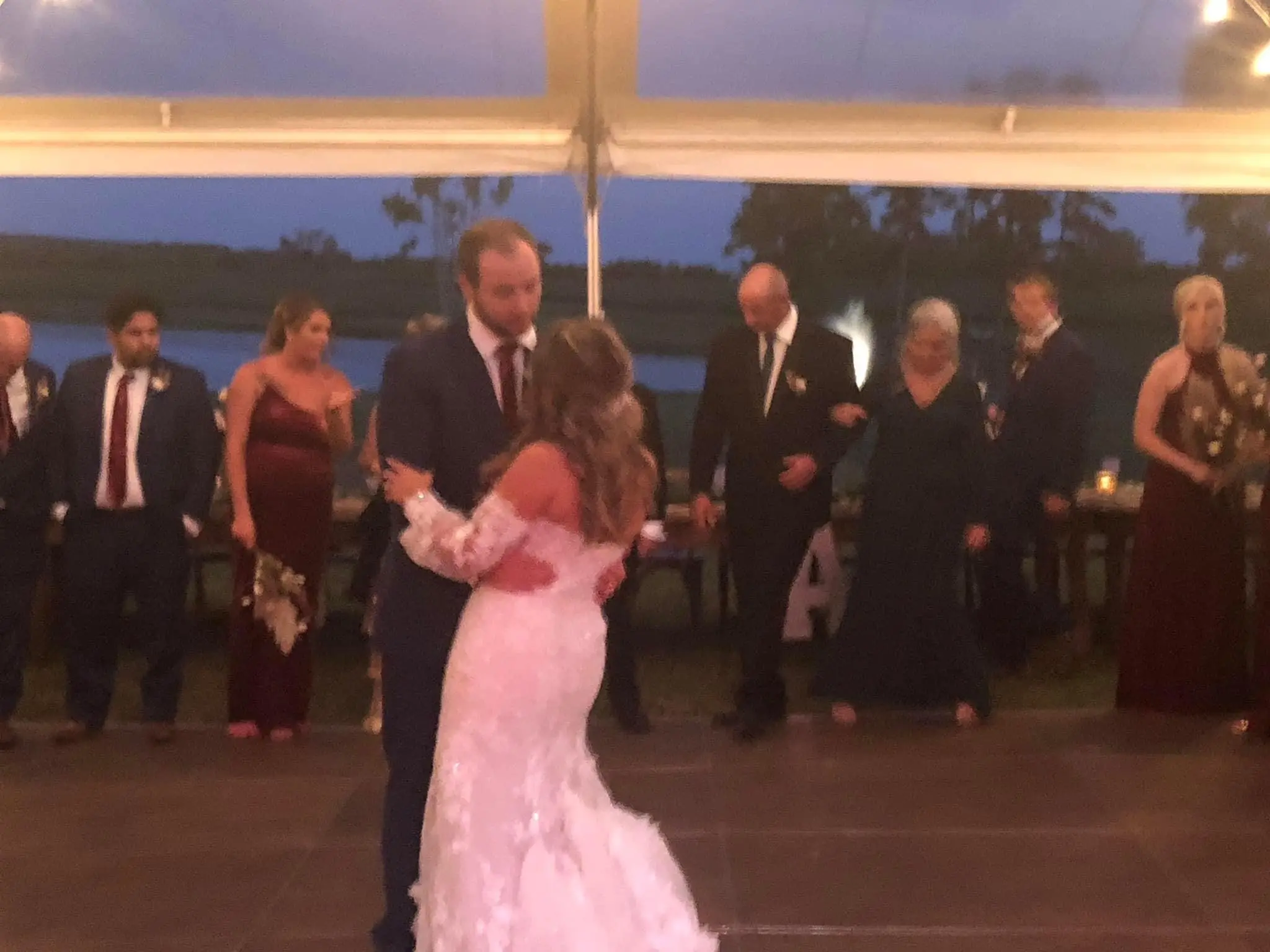 Bride Wearing 3-D Floral Fit-And-Flare Wedding Dress Called Ryker By Sottero And Midgley Dancing With Groom