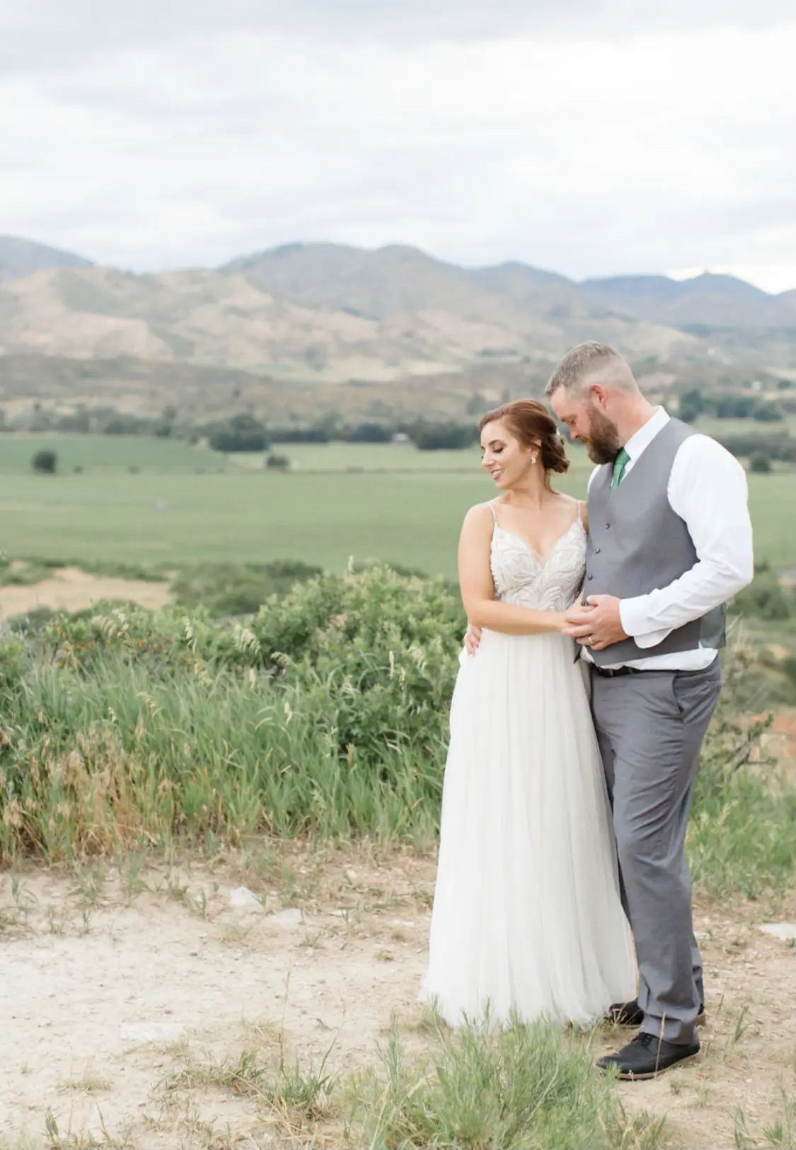 Groom With Bride Wearing Relaxed A-Line Wedding Dress Called Charlene By Maggie Sottero