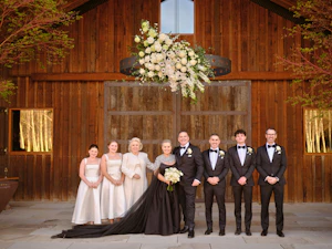 Bride wearing Aspen by Sottero and Midgley with her wedding party