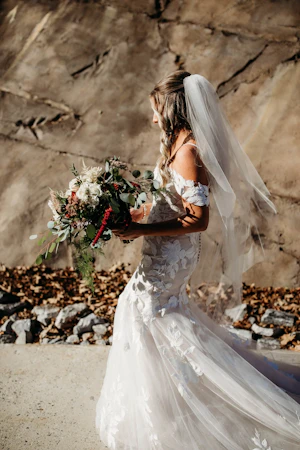 Bride Wearing Mermaid Wedding Dress With Oversized Lace Called Hattie By Rebecca Ingram