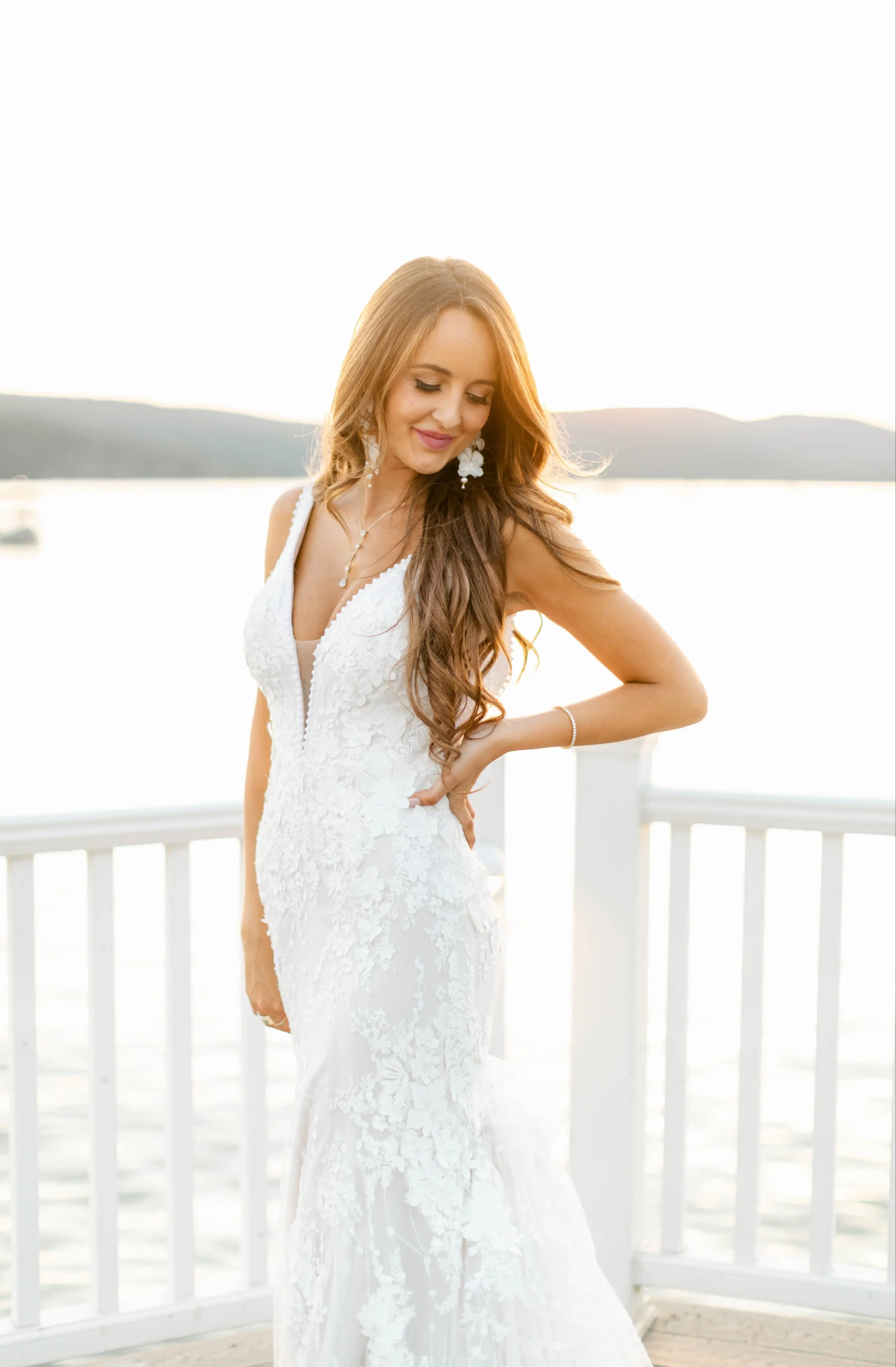 Bride in Mermaid Wedding Dress with 3-D Floral Motifs Called Cruz by Sottero & Midgley