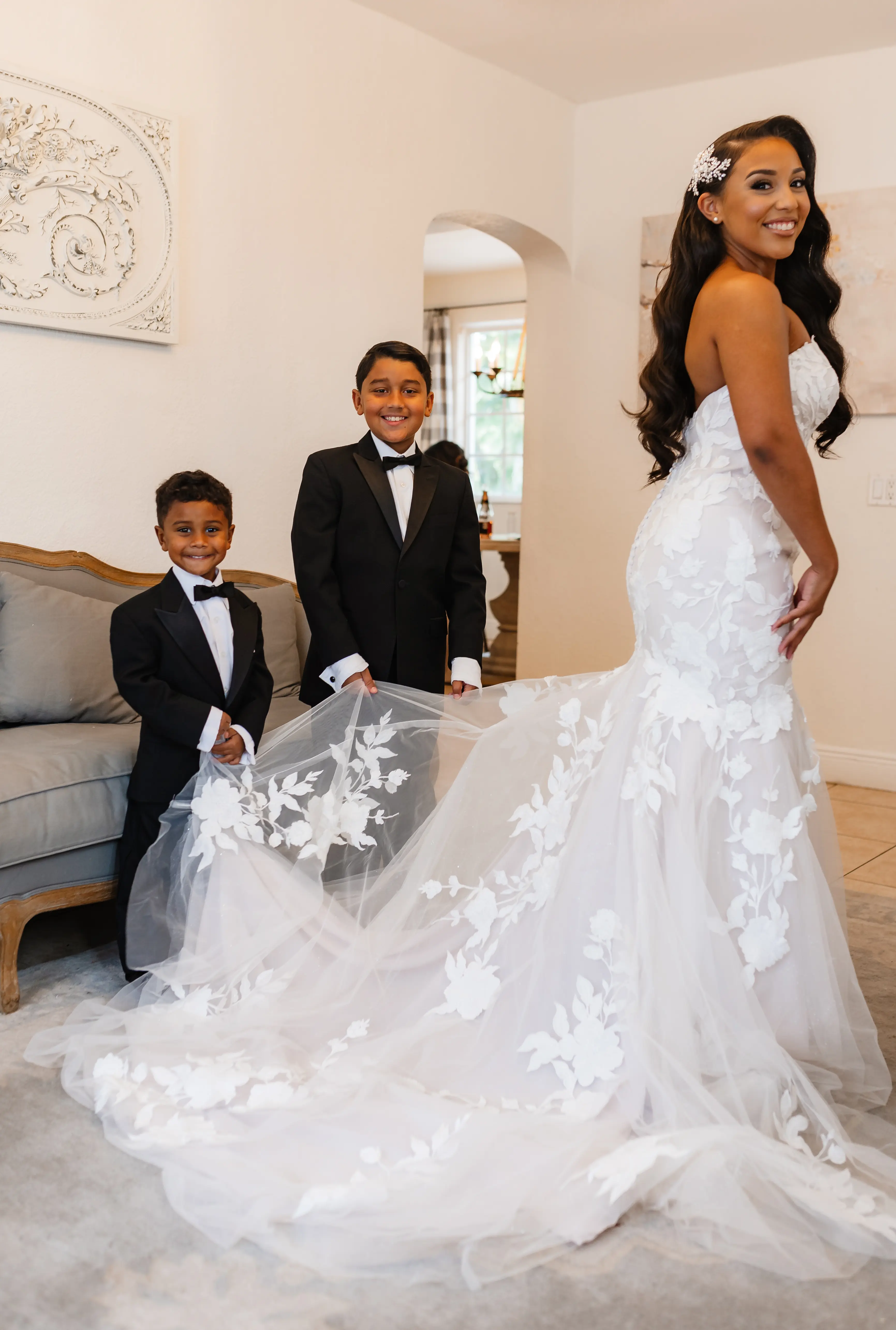 Real Bride in Strapless Mermaid Bridal Gown in Oversized Lace with Floral Lace Motifs over Sparkle Tulle and Sweetheart Neckline called Hattie by Rebecca Ingram