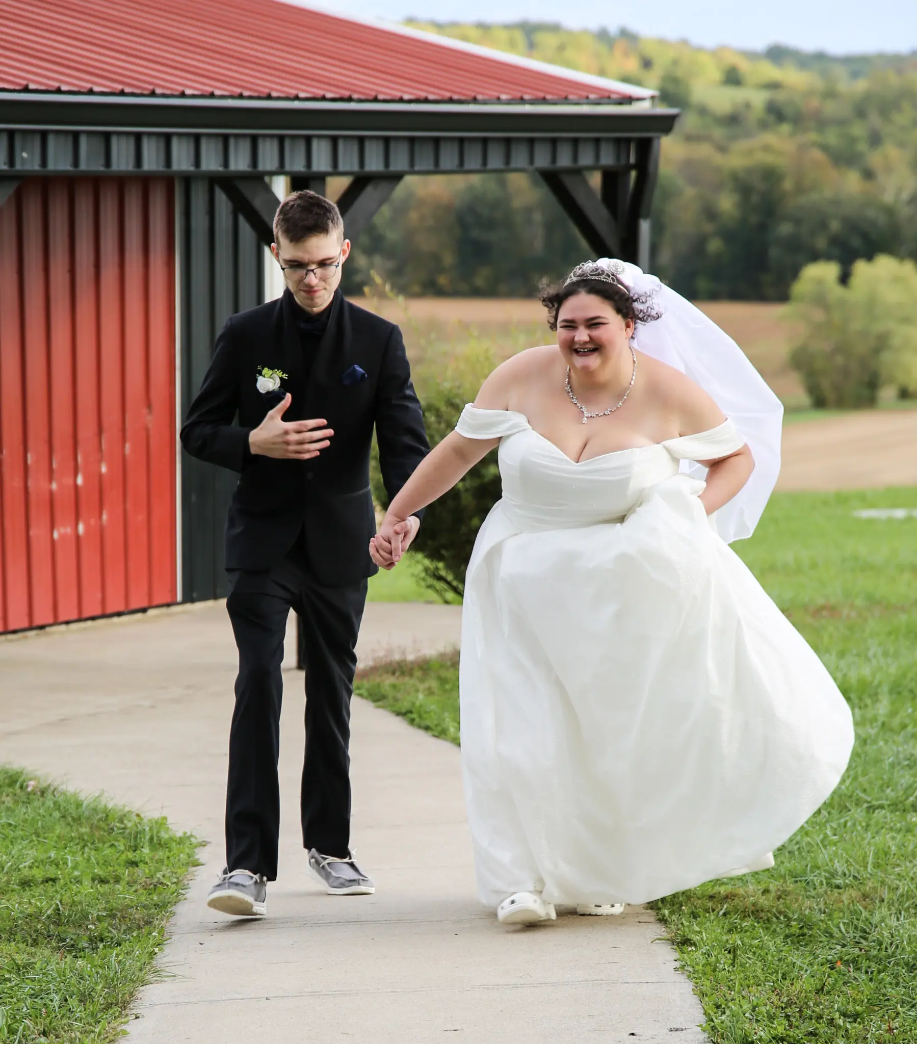 Bride wearing Anniston by Maggie Sottero with her husband