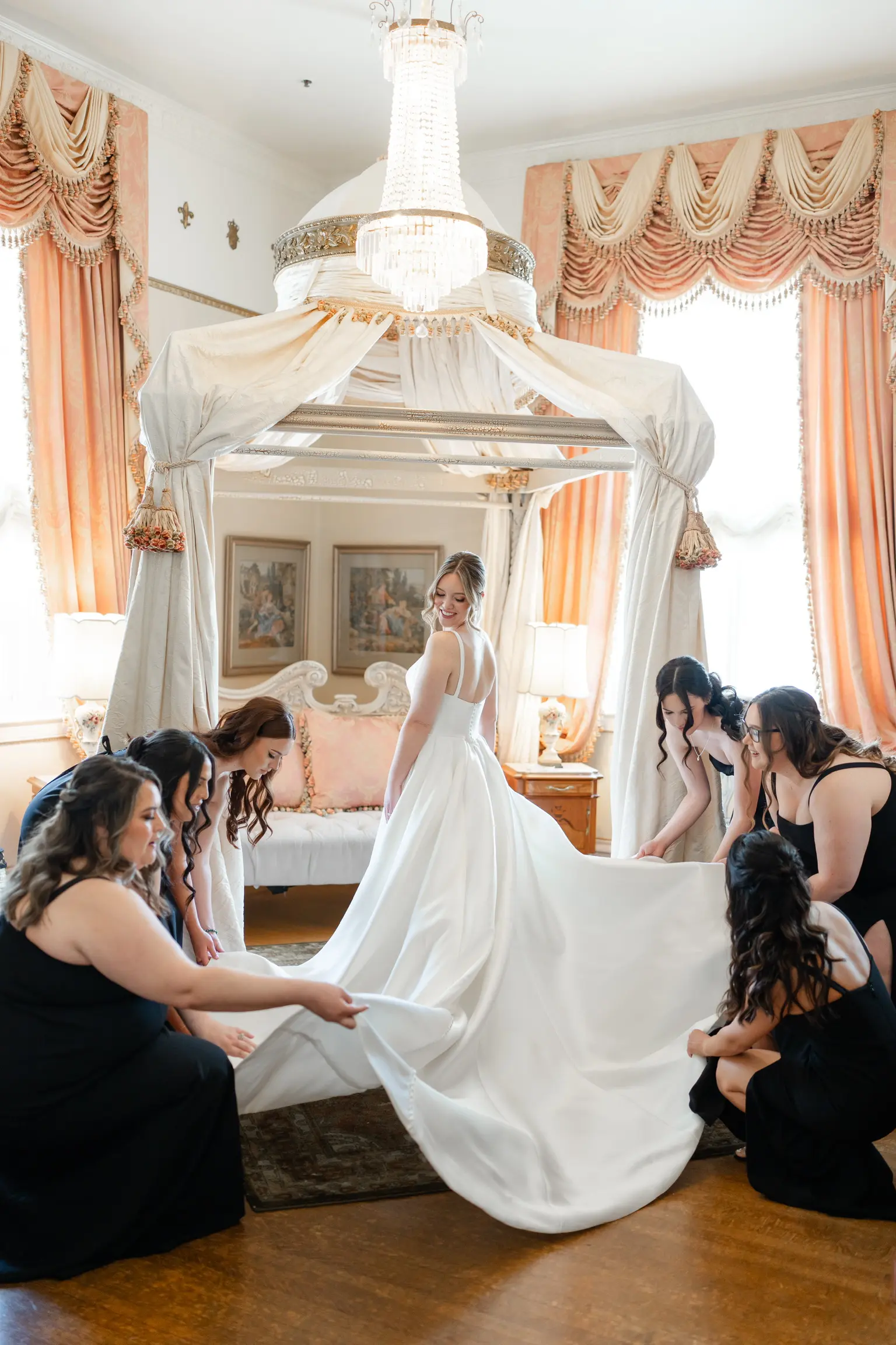 Bride wearing Selena by Maggie Sottero with her bridesmaids