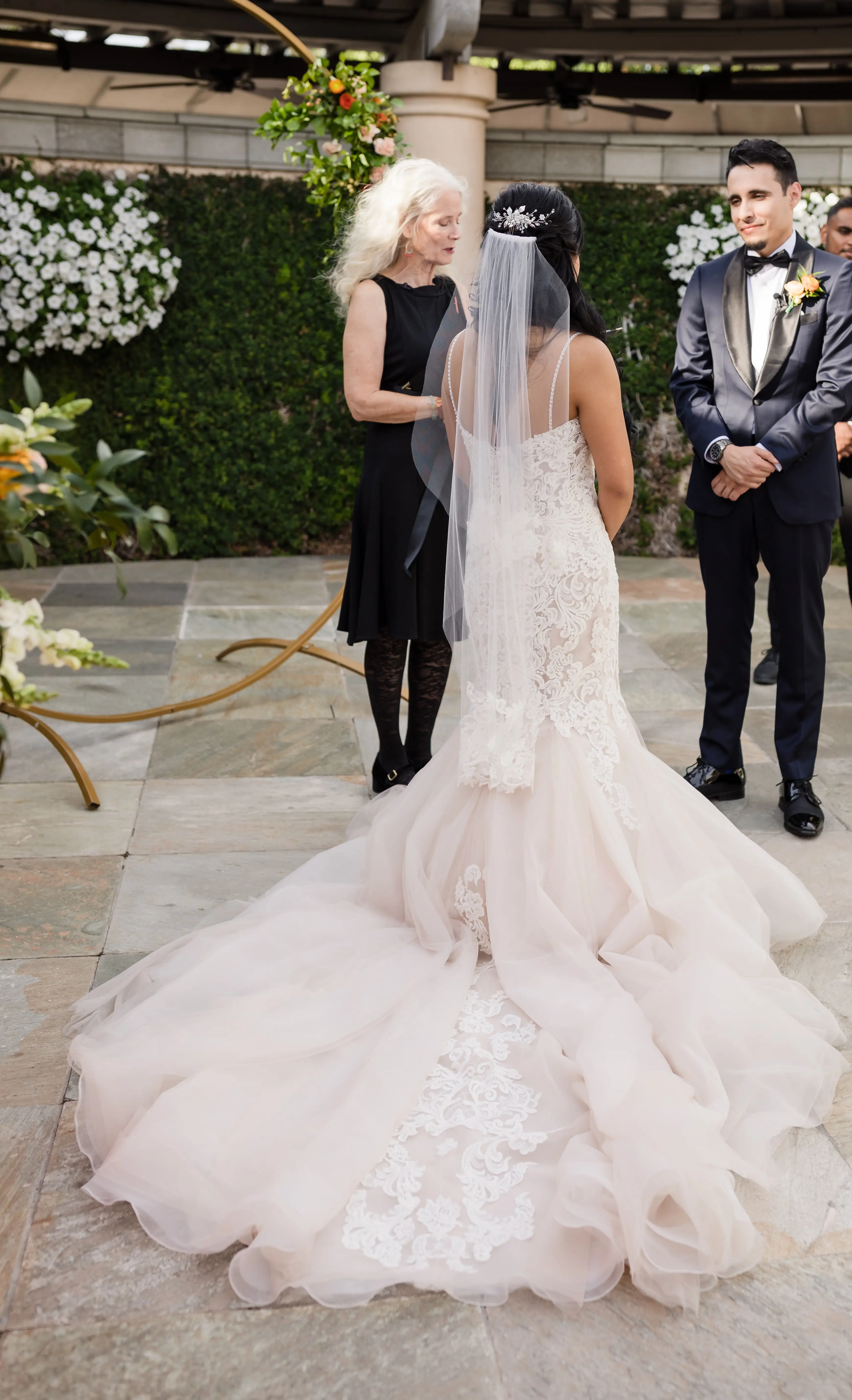 Bride Wearing Lace Fit and Flare Wedding Dress by Maggie Sottero Bride During Ceremony