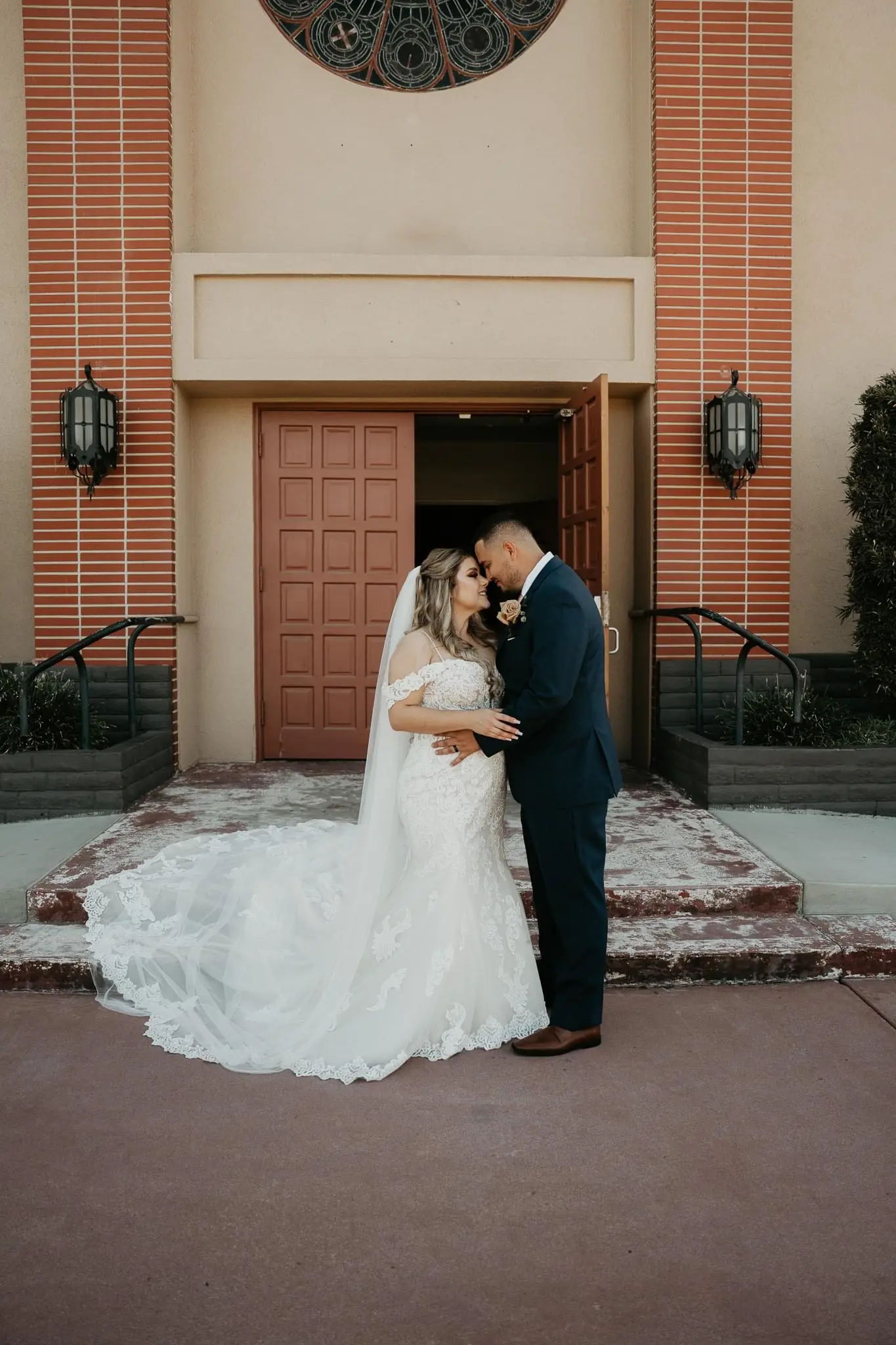 Groom Kissing Bride In Sparkley Off The Shoulder Wedding Dress Named Fiona By Maggie Sottero