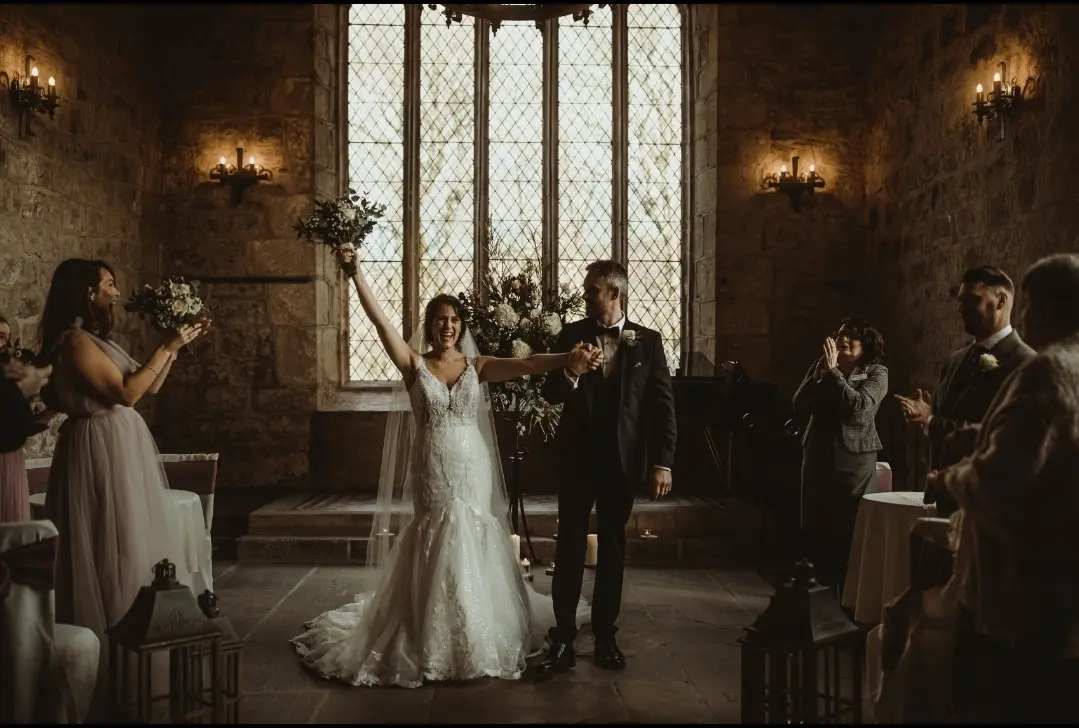 Real Bride in V-Neckline Mermaid Wedding Dress Named Joss by Sottero & Midgley with Groom