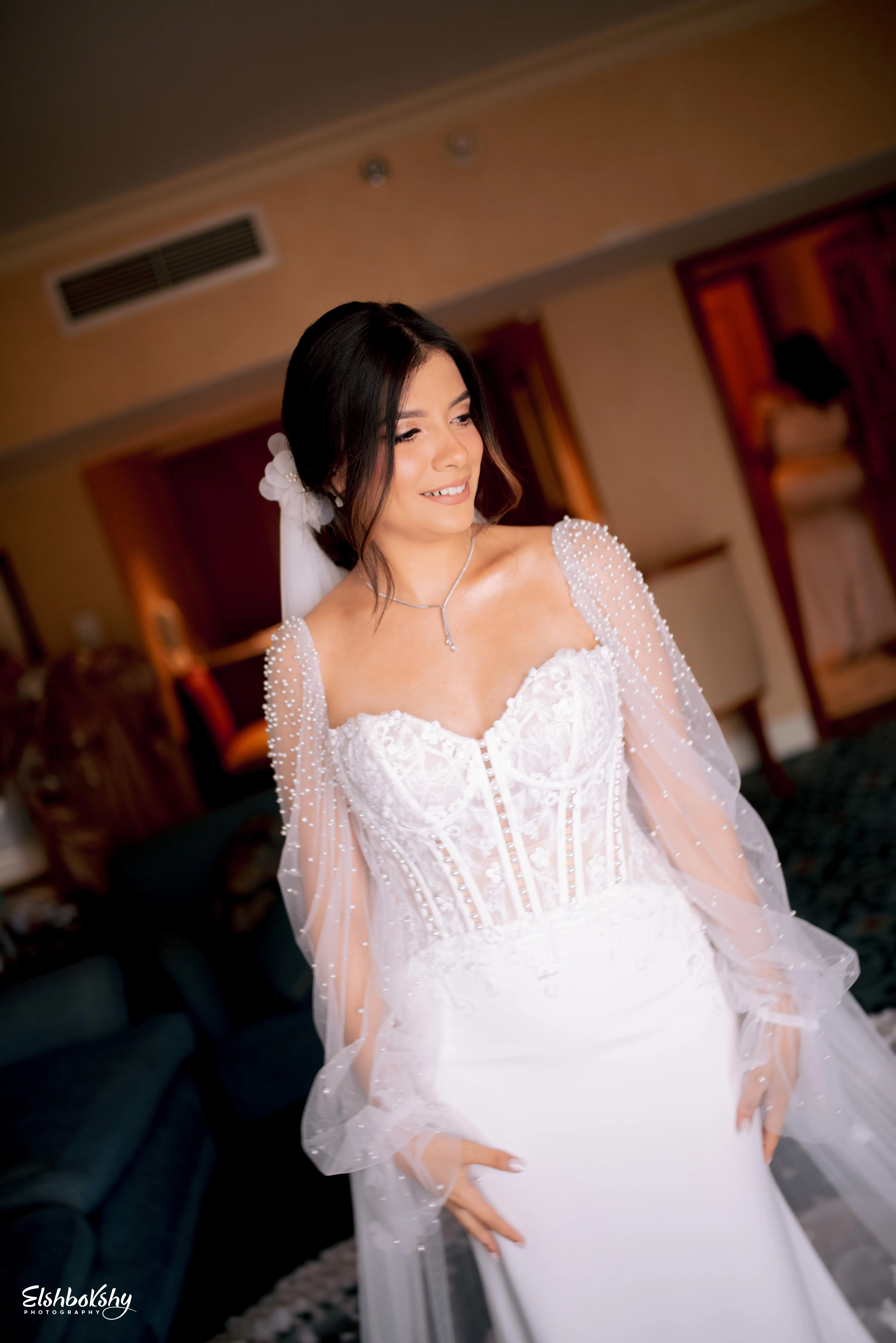 Bride Wearing Sheath and Beaded Wedding Dress Called Doritte By Maggie Sottero