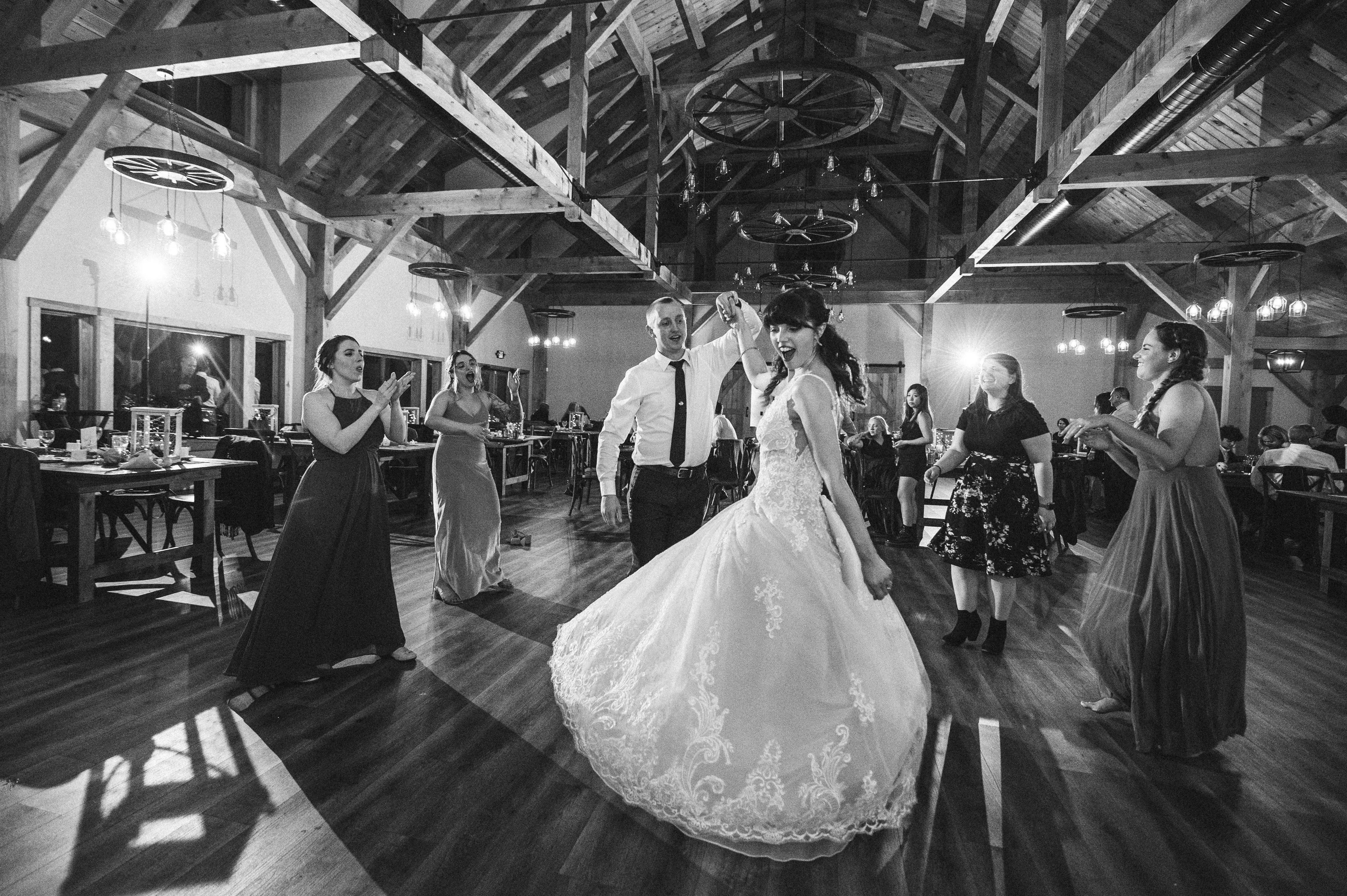 Bride Wearing Lace A-Line Wedding Dress Called Wallis By Maggie Sottero Dancing With The Groom