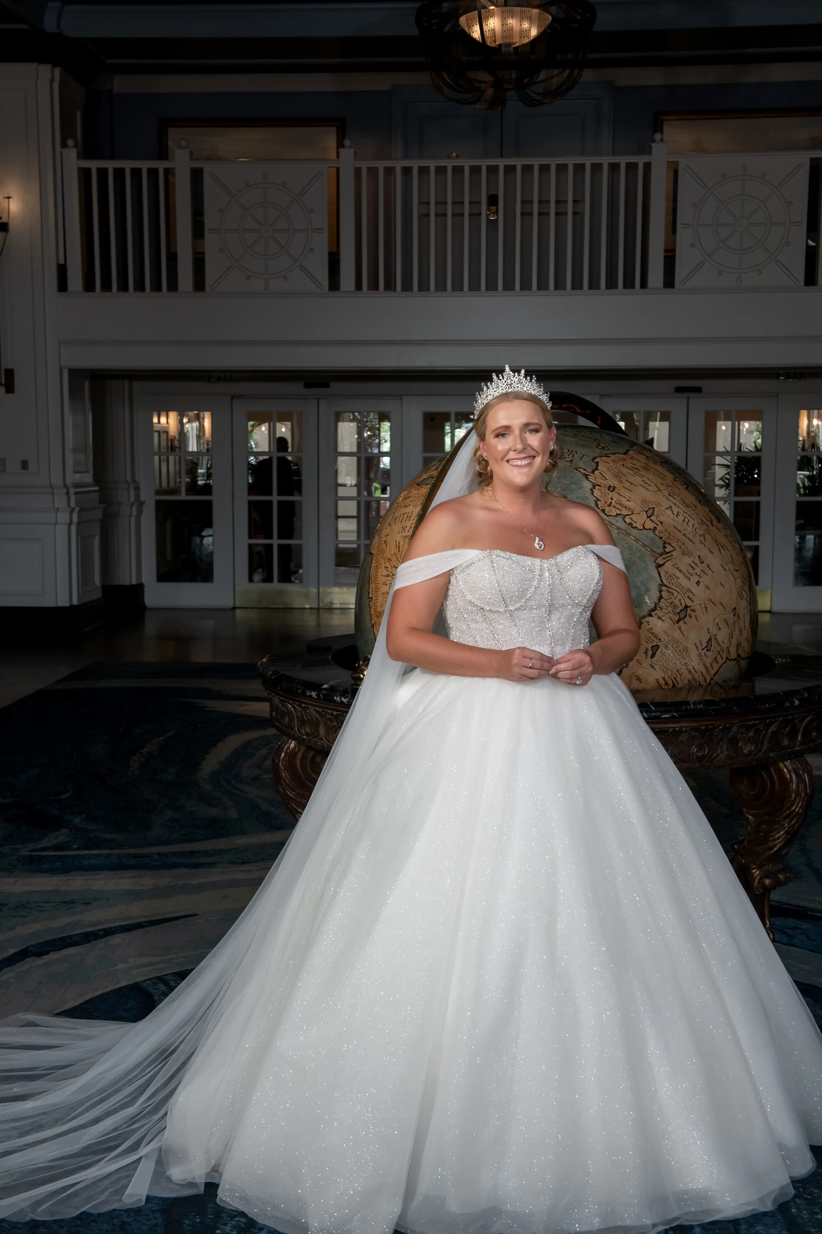 Bride wearing Elton wedding dress by Sottero and Midgley