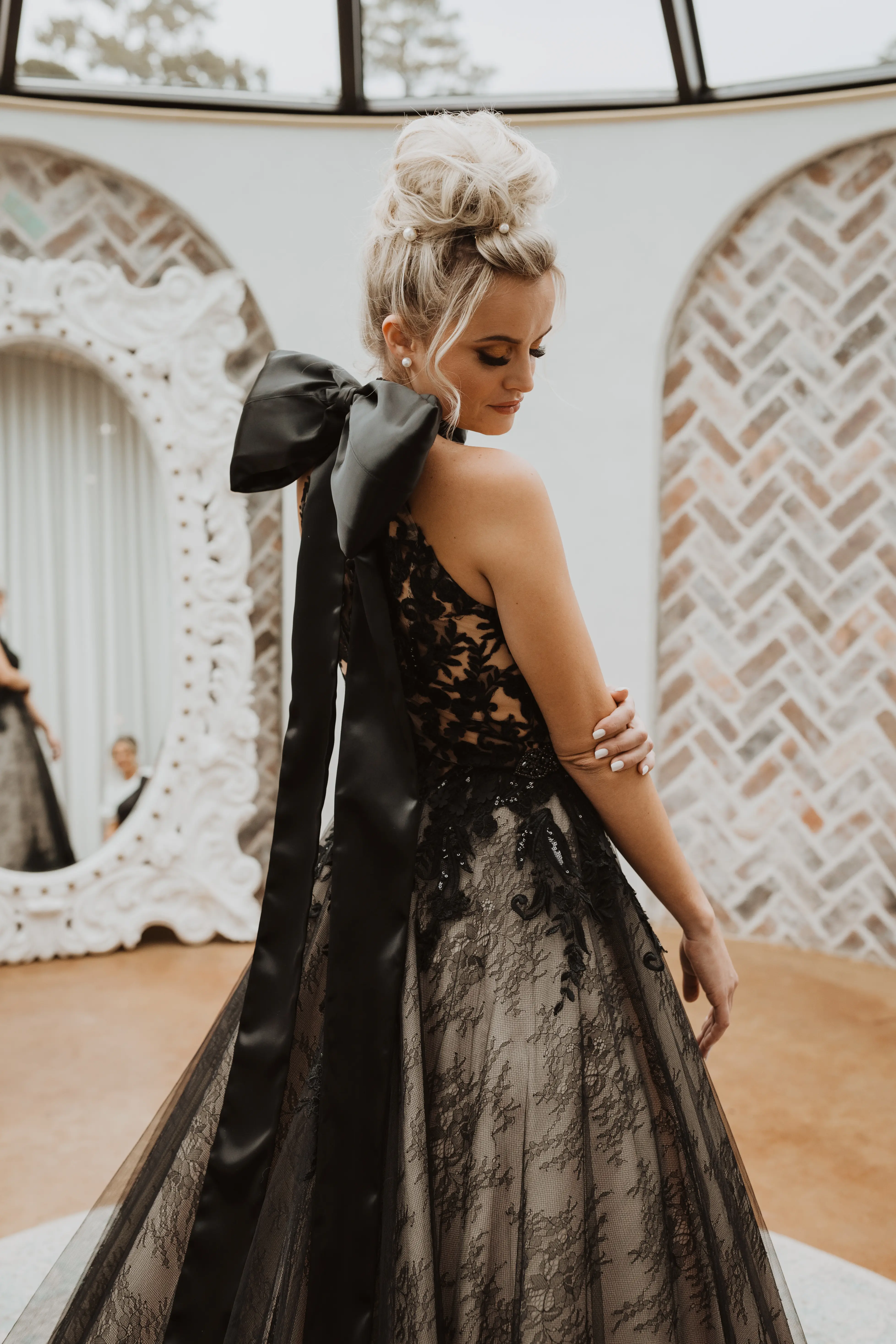 Real Bride in Beautiful Black Ball Gown Wedding Dress with Contrasting Layers of Tulle, Lace Motifs, and Chantilly Lace Called Zander by Sottero & Midgley