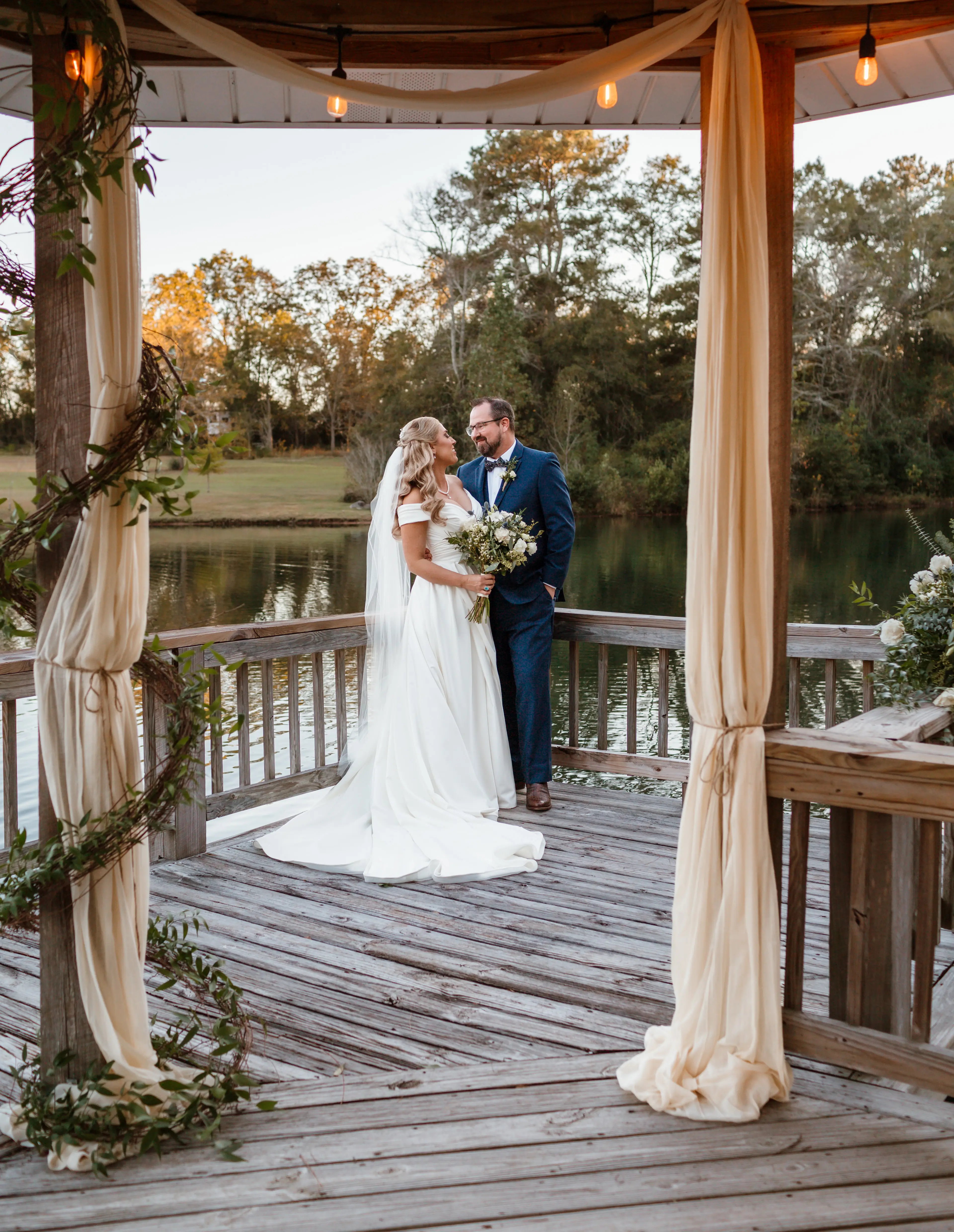 Bride wearing Ekaterina wedding dress by Maggie Sottero with her husband
