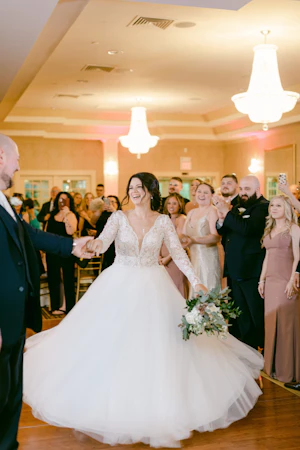 Bride Wearing Ballgown With Long Sleeves Called Mallroy Dawn By Maggie Sottero