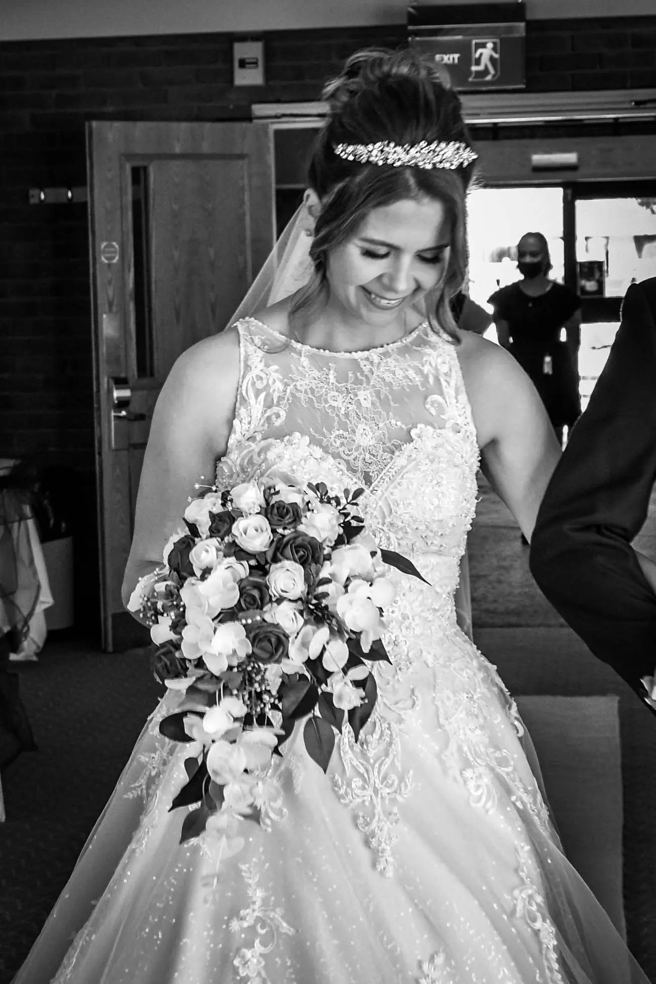 Bride wearing a lace and tulle ballgown wedding dress