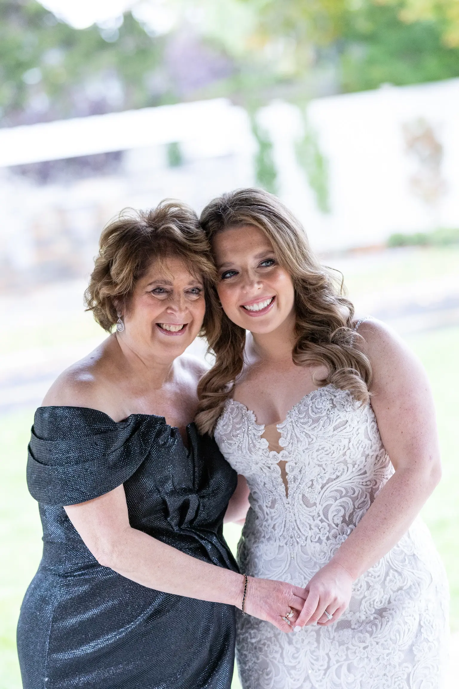 Bride Wearing Lace Fit-And-Flare Wedding Dress Called Fiona By Maggie Sottero With Mother-Of-The-Bride