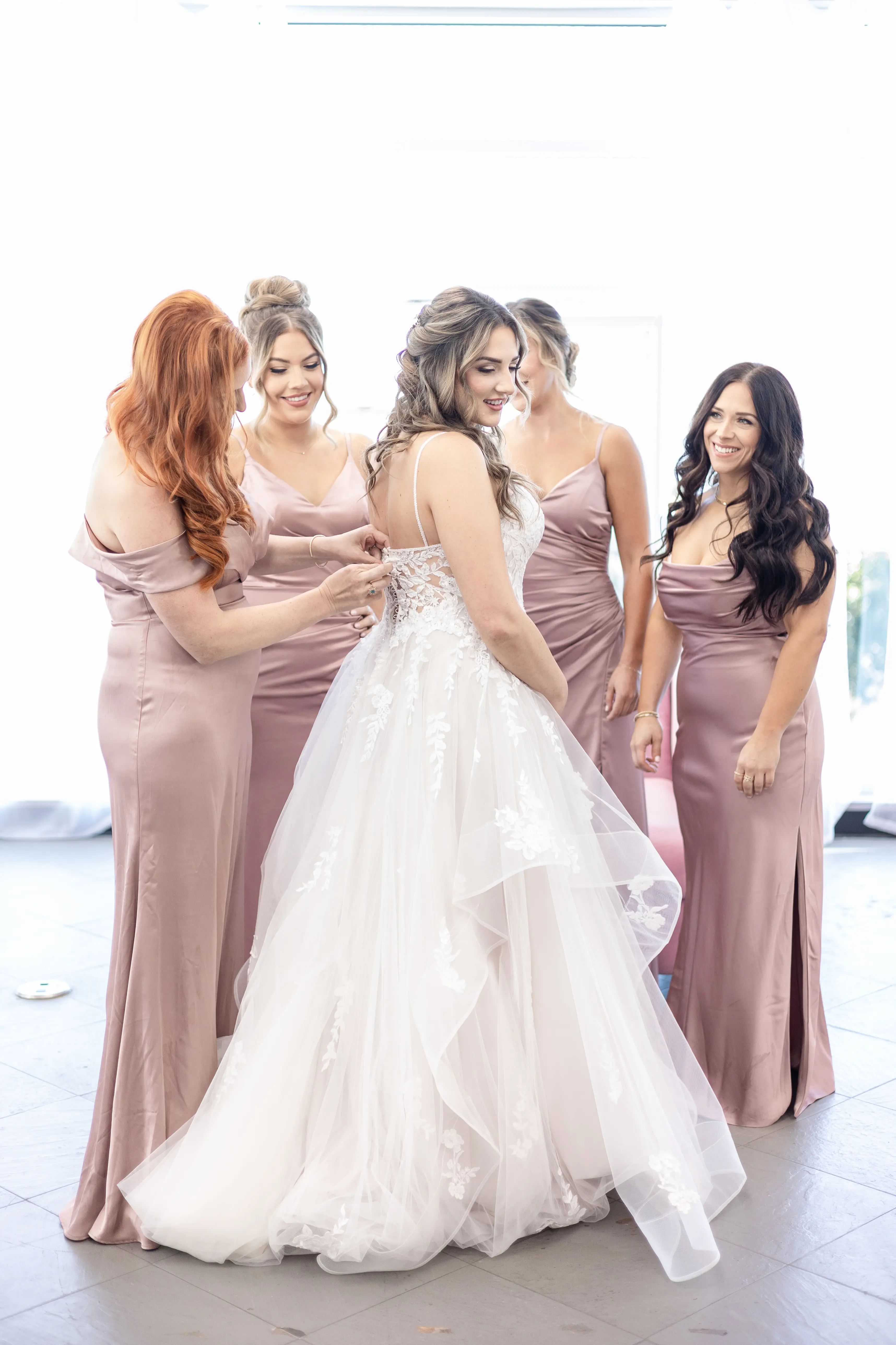 Bride Wearing Lace Wedding Dress With Tiered Tulle Skirt Lettie By Rebecca Ingram