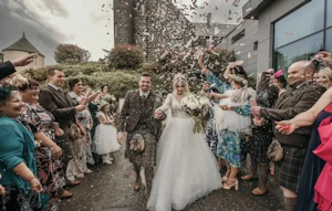 Groom With Bride Wearing Long Sleeved Ball Gown Mallory Dawn By Maggie Sottero