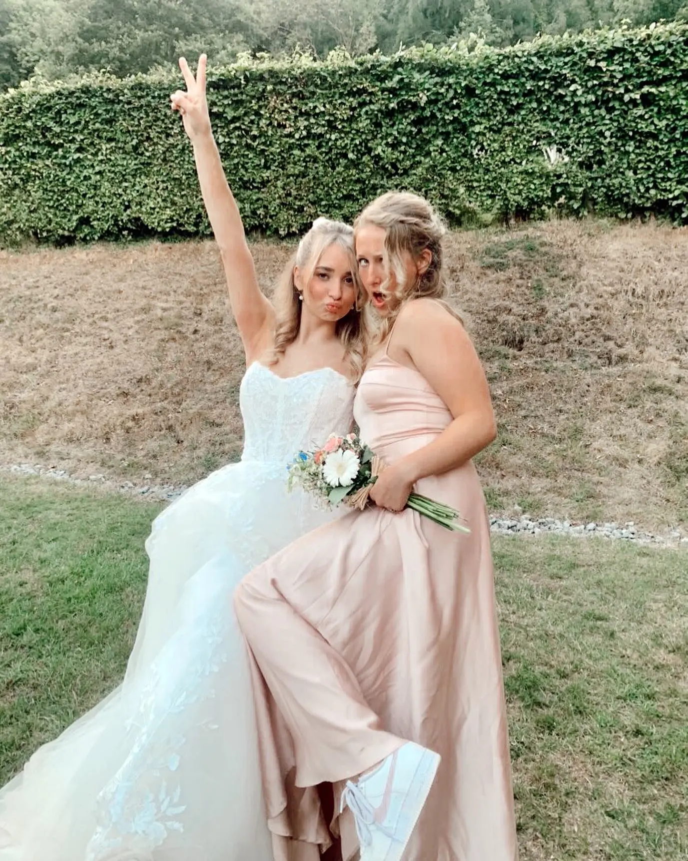 Real Bride in V-Back and Corset Detail Wedding Dress Named Harlem by Maggie Sottero with Bridesmaid