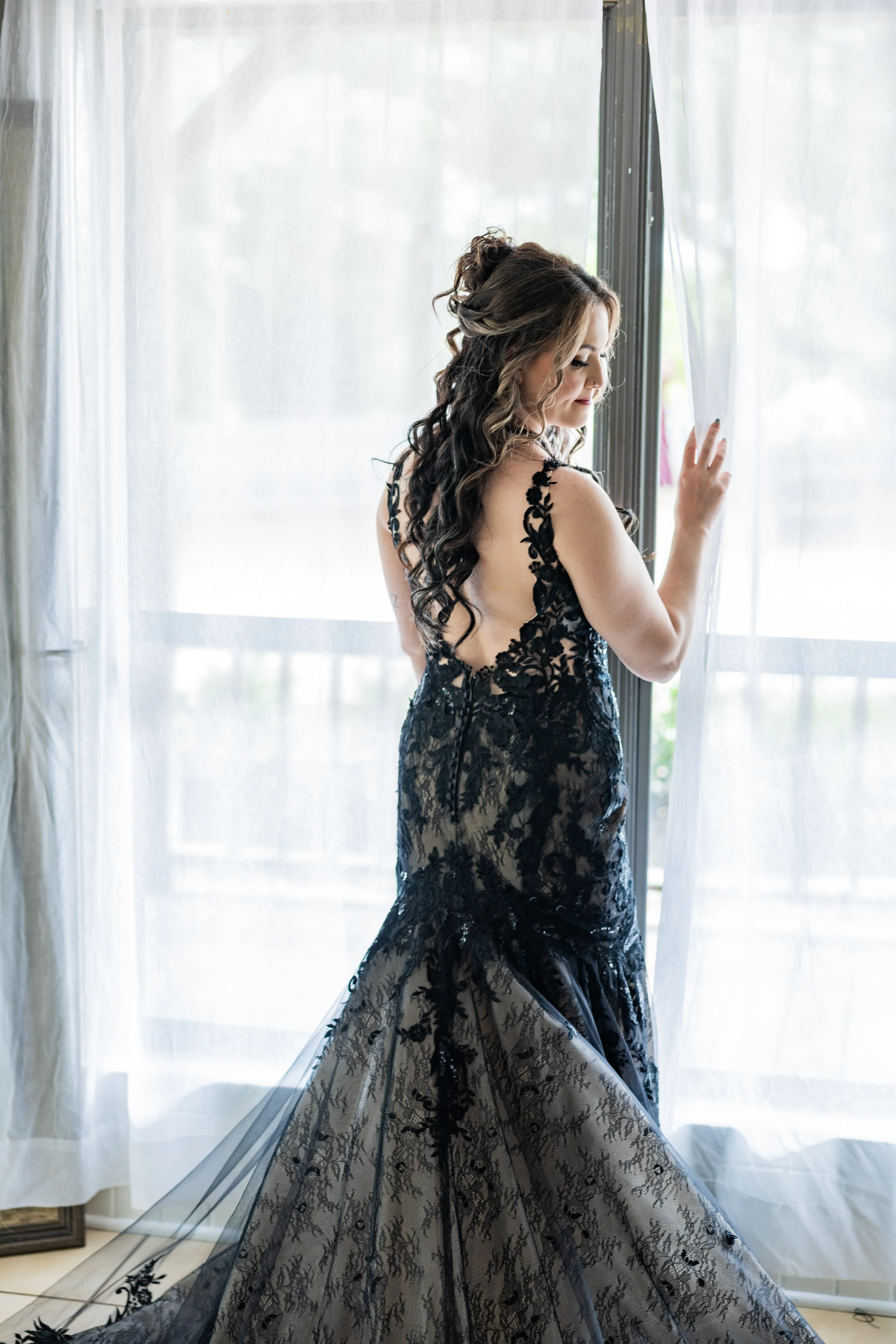 Bride wearing Zander Lane by Sottero and Midgley