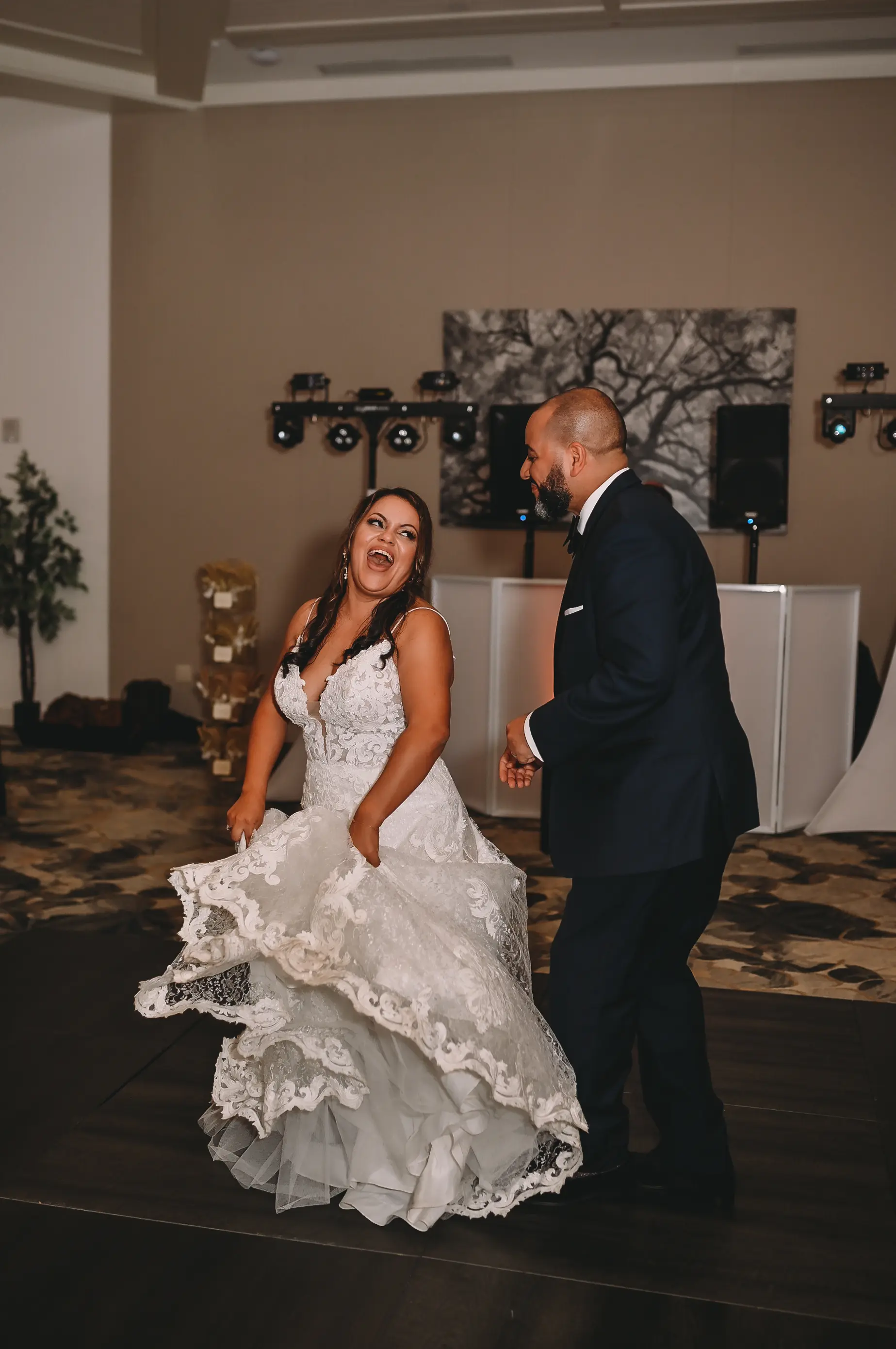 Groom With Bride Wearing A-Line Lace Wedding Dress Tuscany Lane By Maggie Sottero