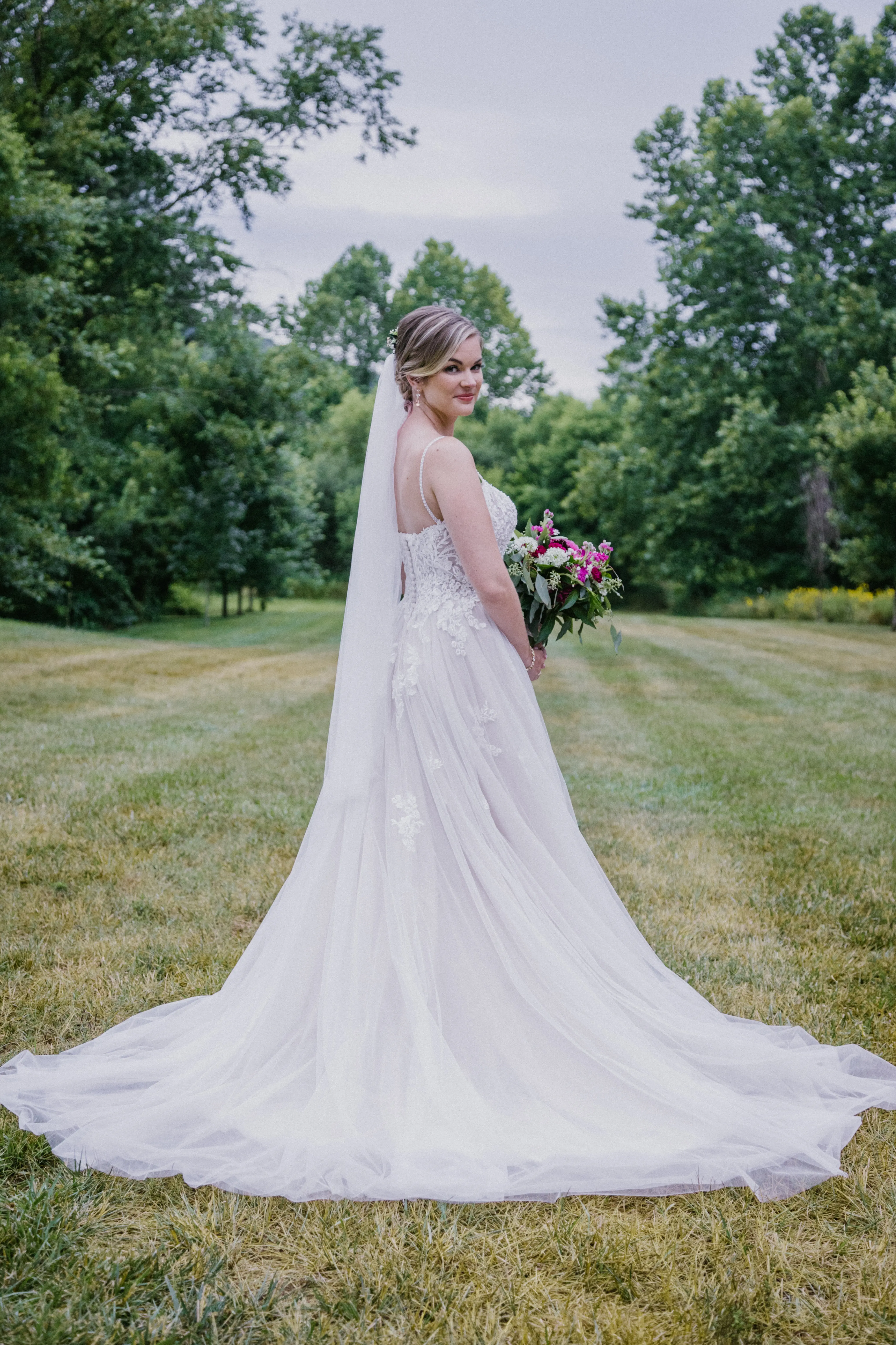 Bride Wearing A-Line Lace Wedding Dress Marisol By Rebecca Ingram