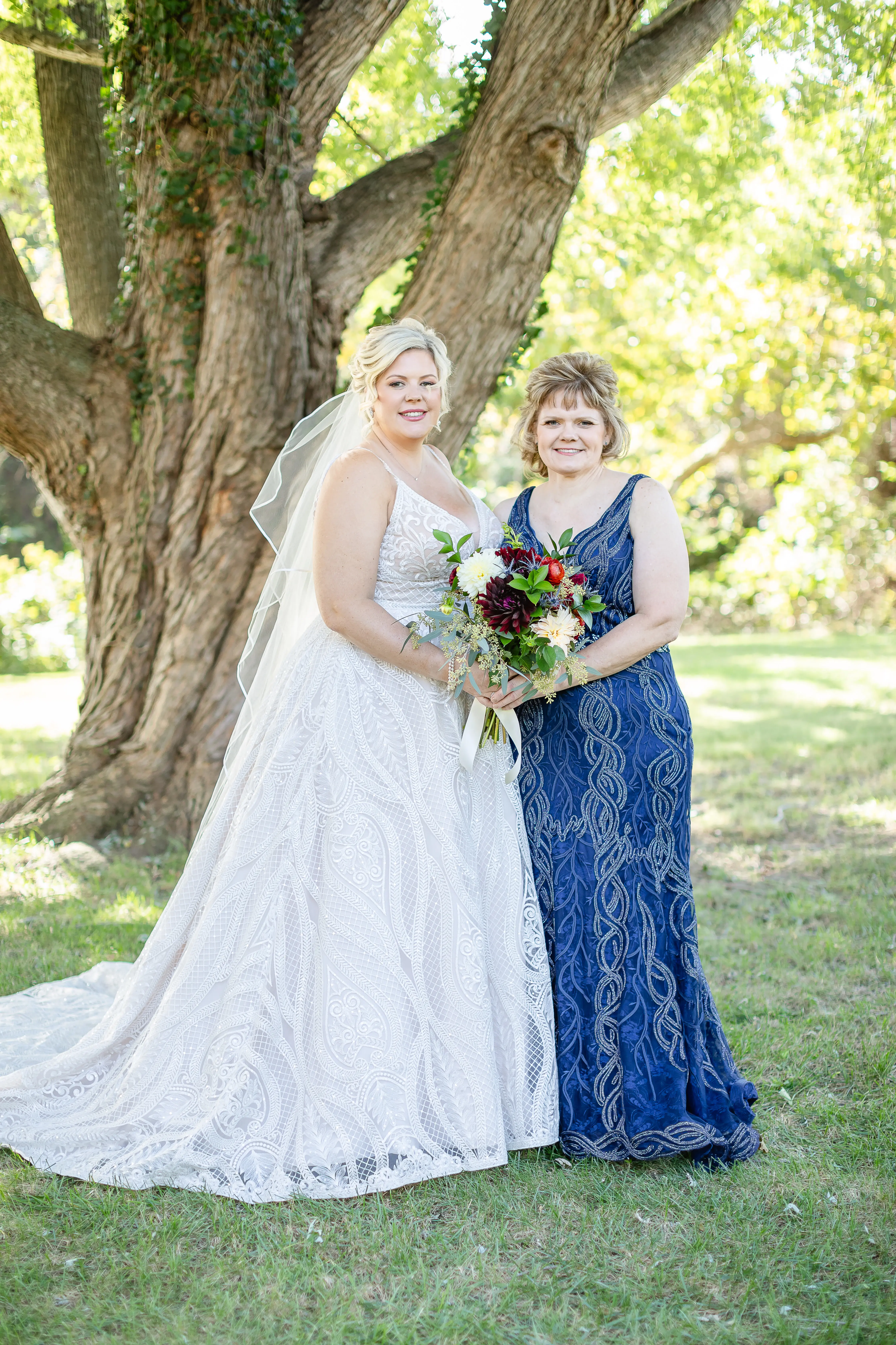 Bride In Unique A-Line Wedding Dress Called Roxanne By Sottero And Midgley With Mother Of The Bride