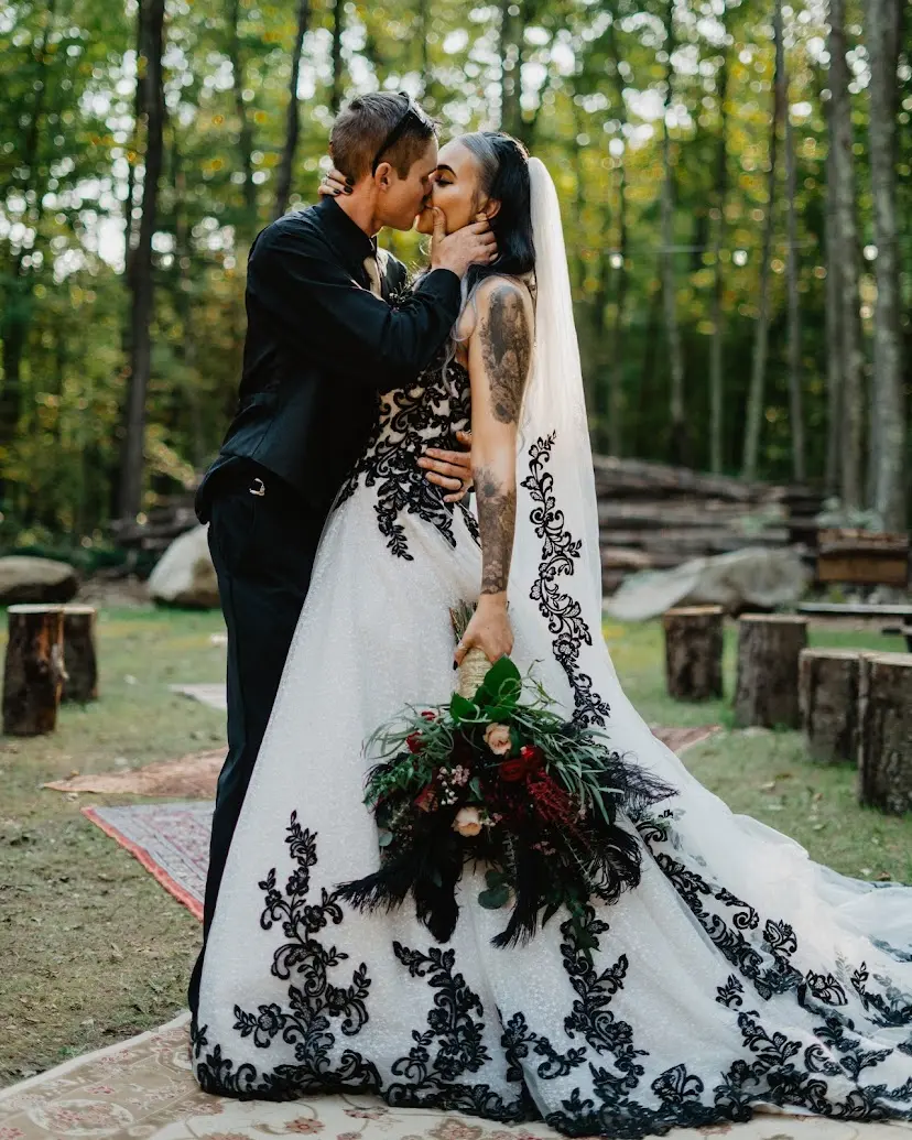 Groom With Bride Wearing Ball Gown With Black Lace Tristyn By Maggie Sottero
