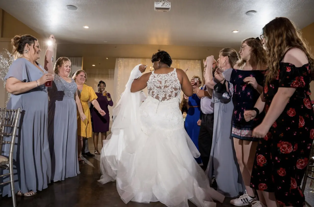 Bride dancing at her wedding reception.